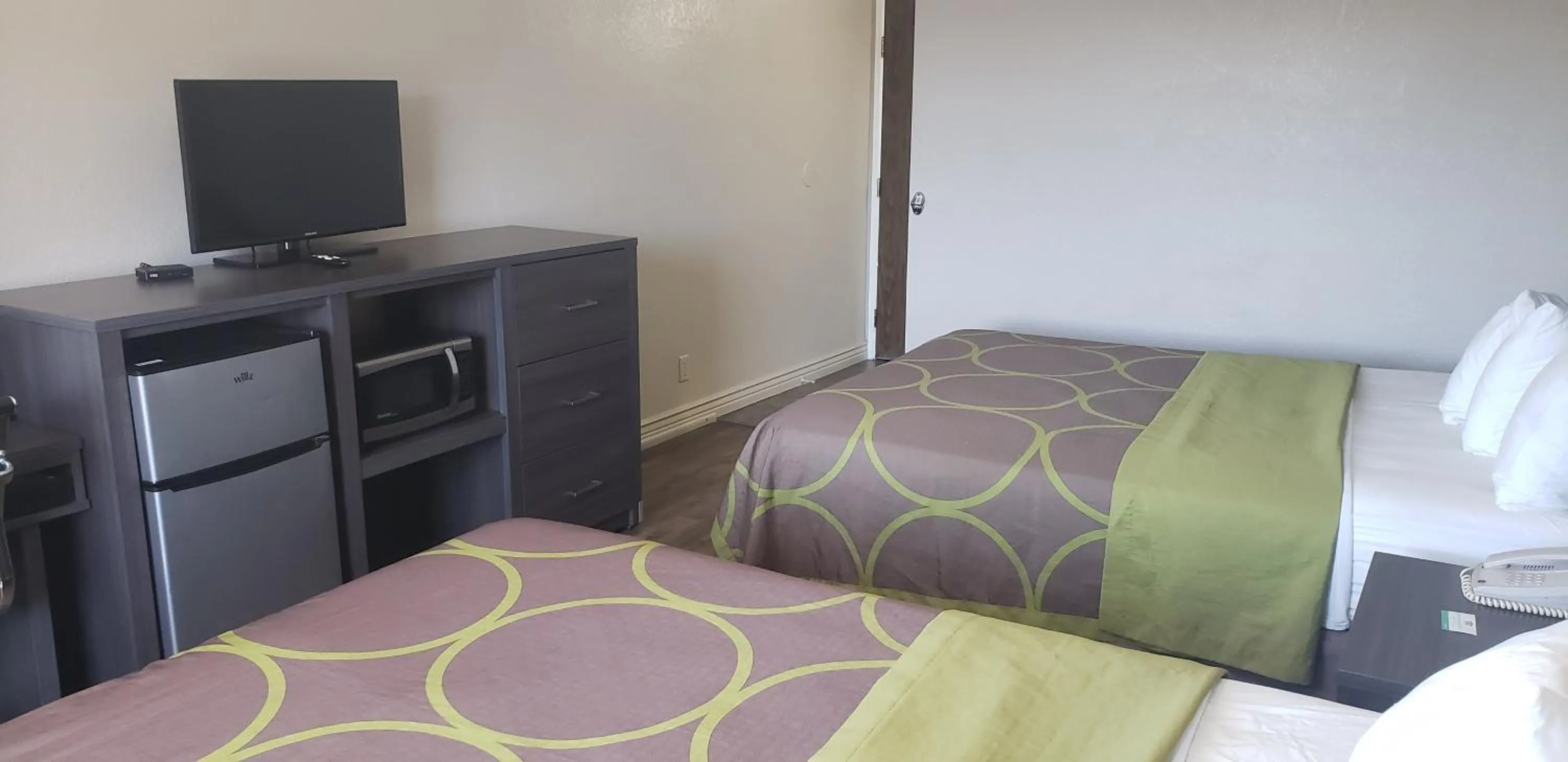 Bed in Super 8 by Wyndham Goodyear/Phoenix Area