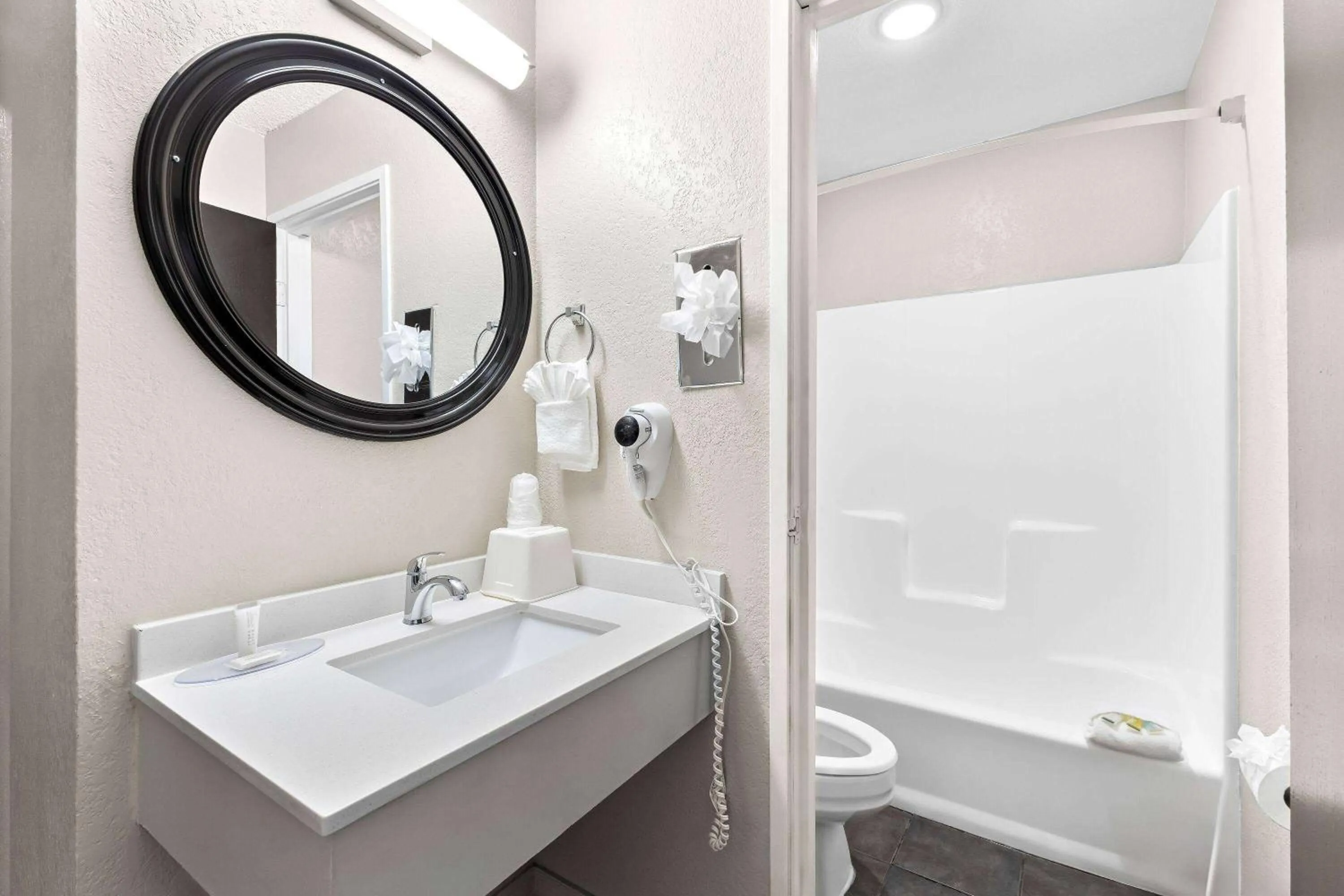 Bathroom in Super 8 by Wyndham Goodyear/Phoenix Area