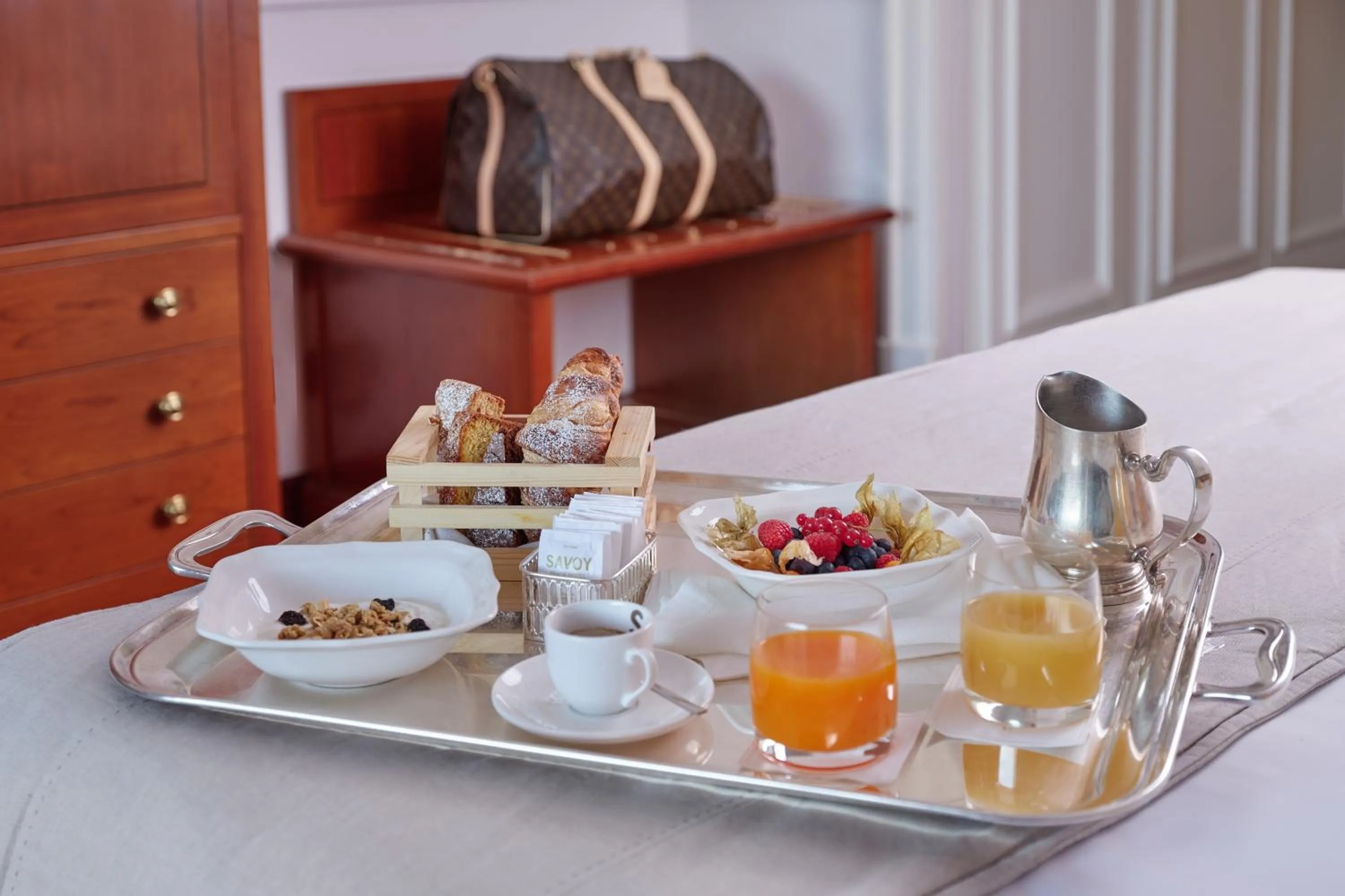 Living room, Bed in Savoy Hotel & Spa - Preferred Hotels & Resorts