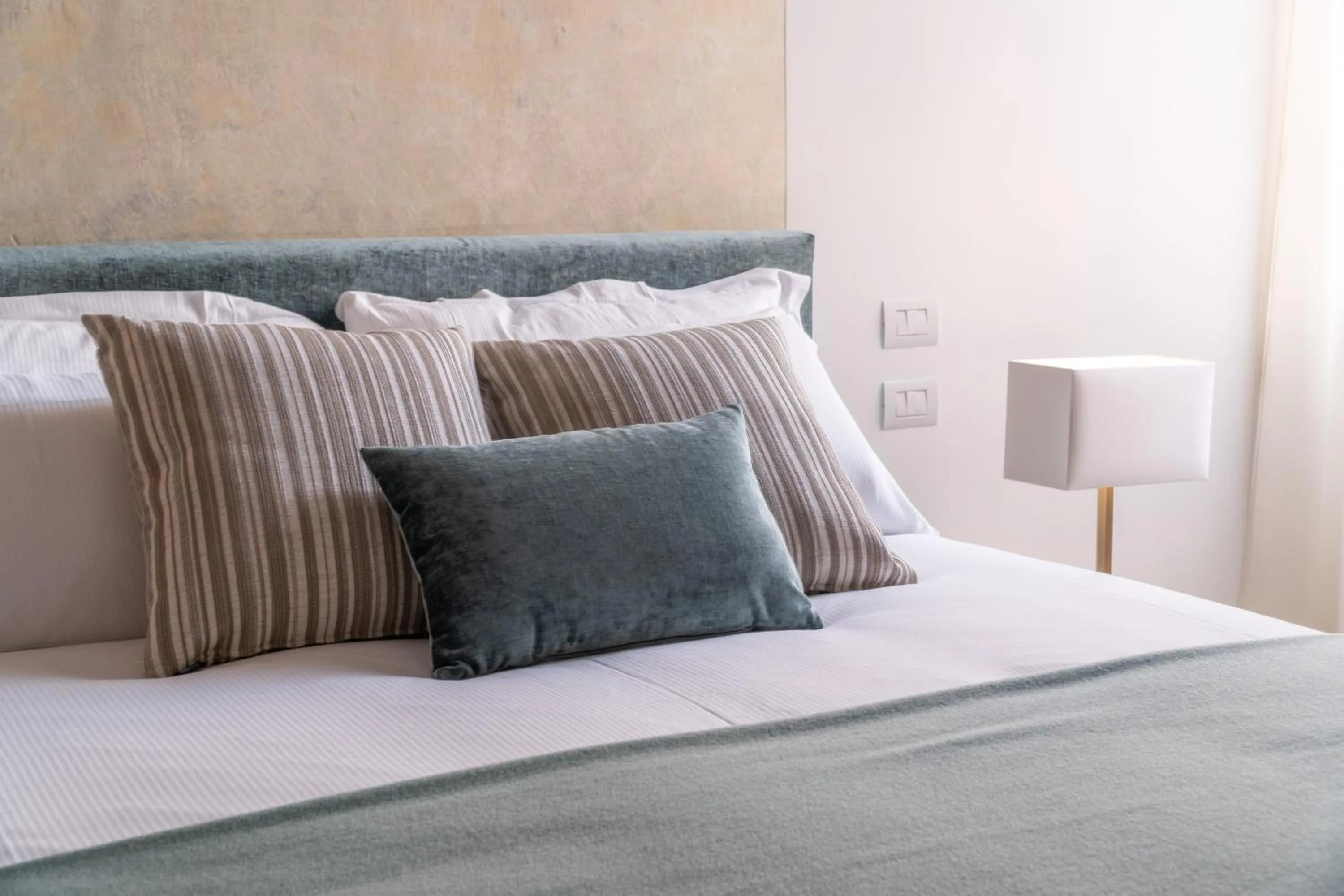 Bed in Ninfea Luxury Suites