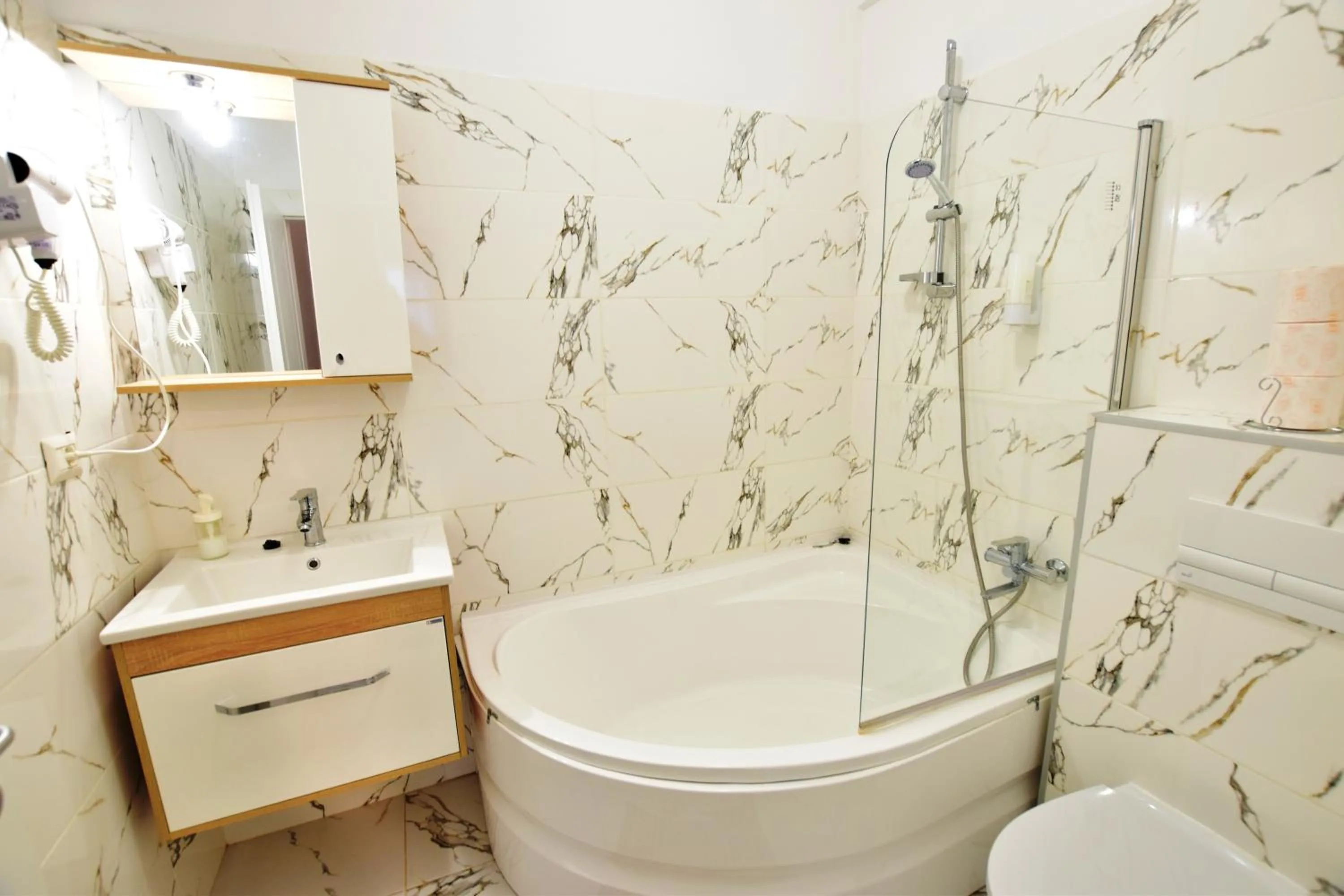 Toilet in Grey Residence Apartments