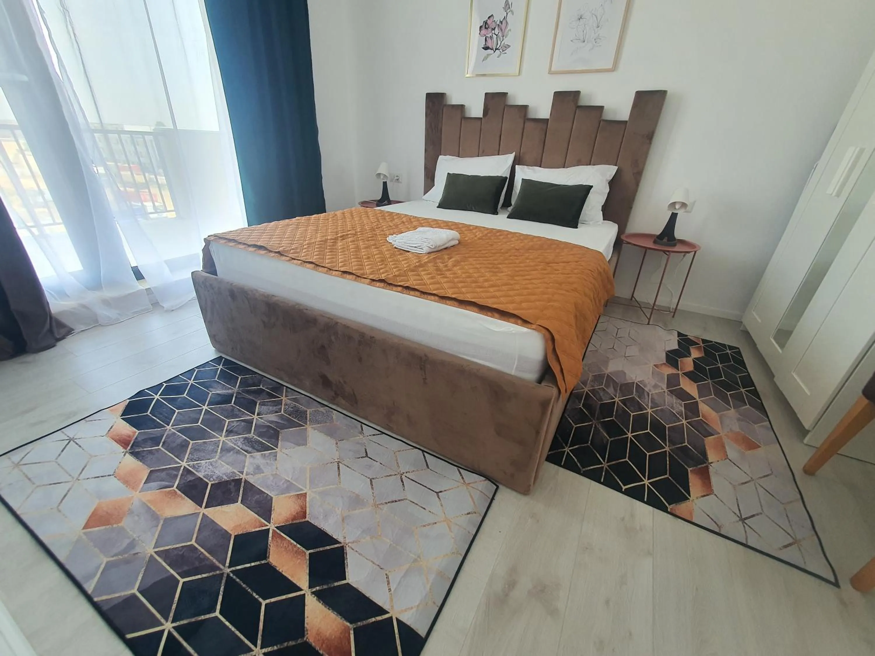 Bed in Grey Residence Apartments