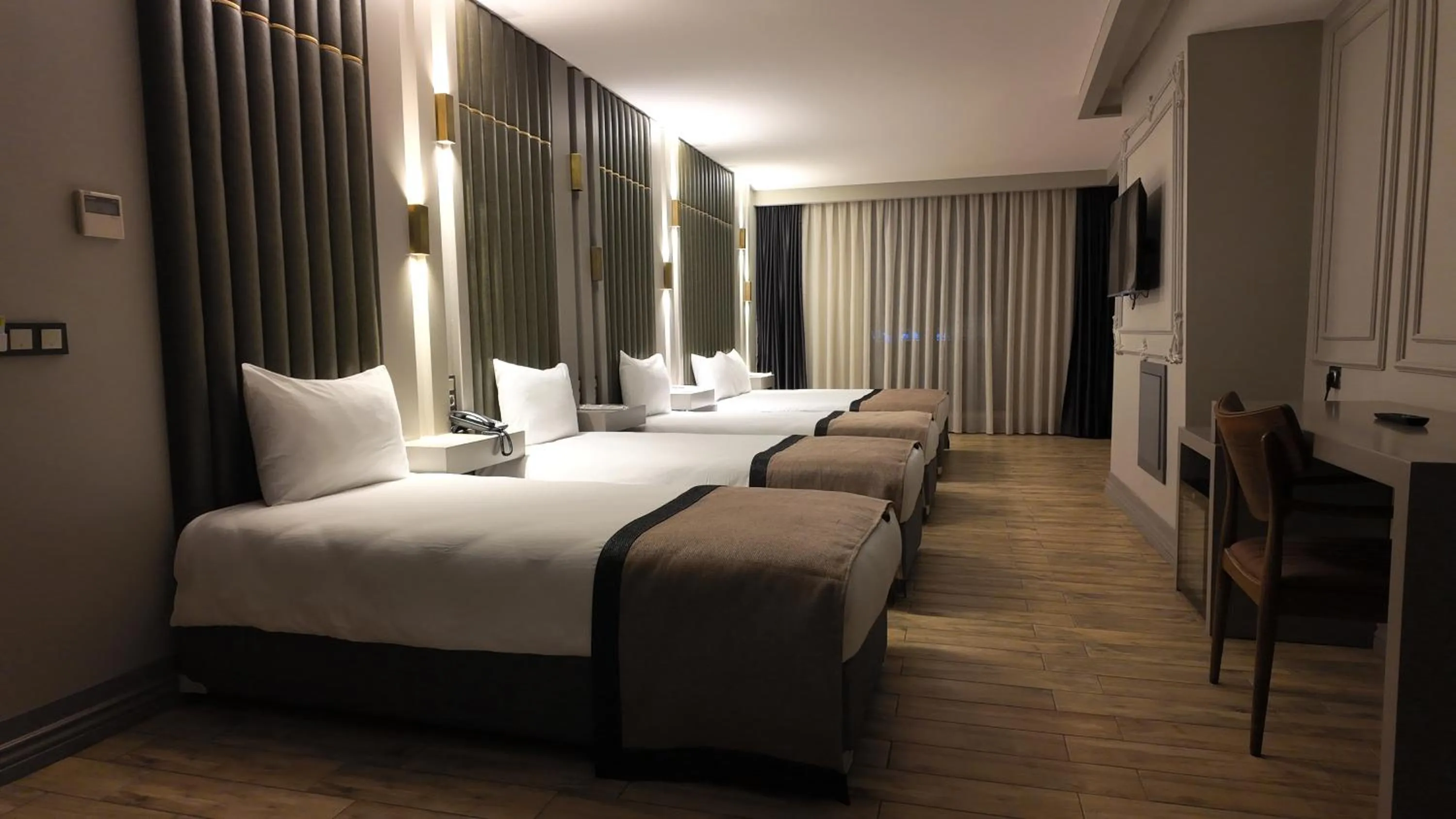 Bed in Lala Grand Hotel