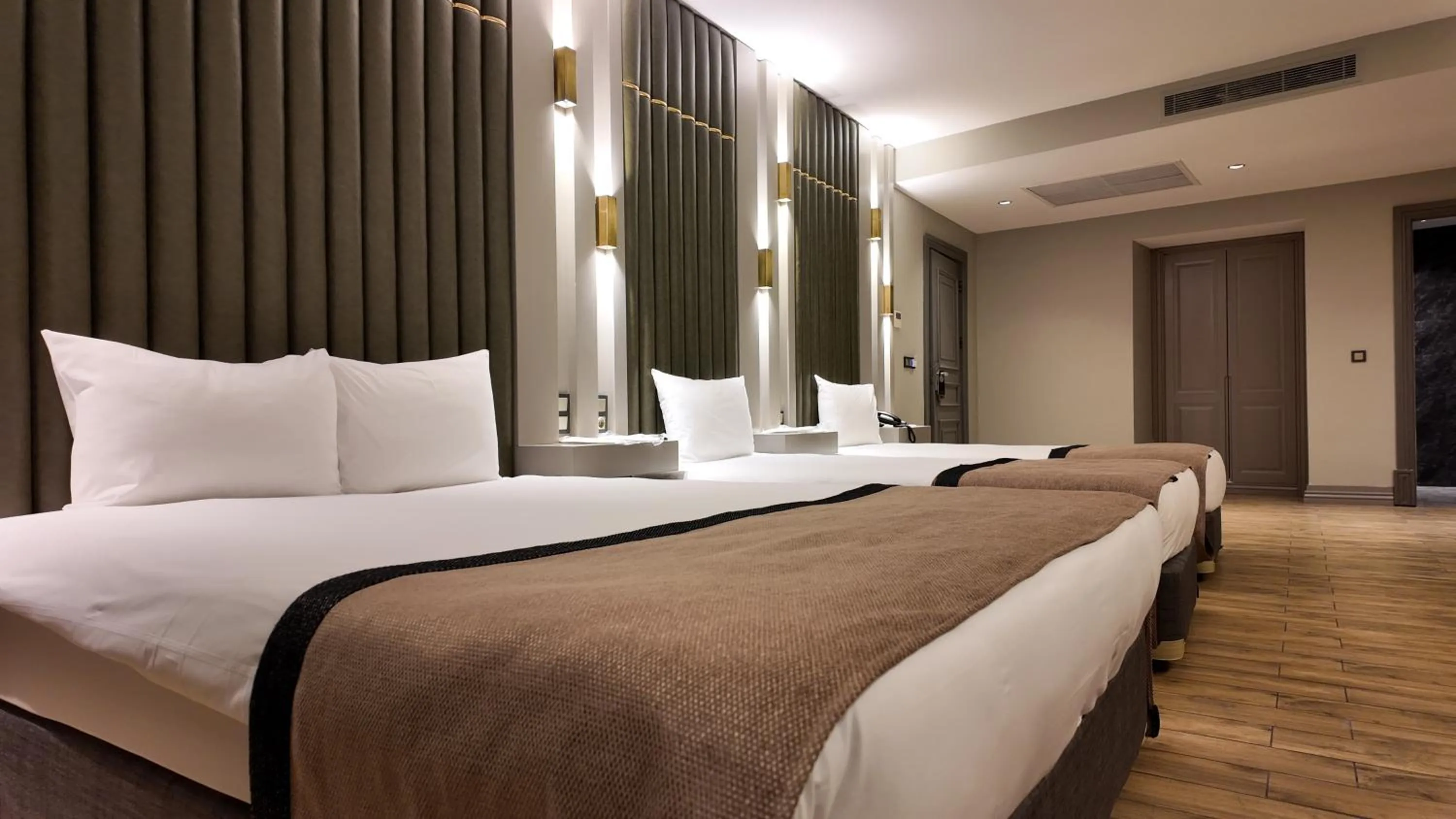 Bed in Lala Grand Hotel