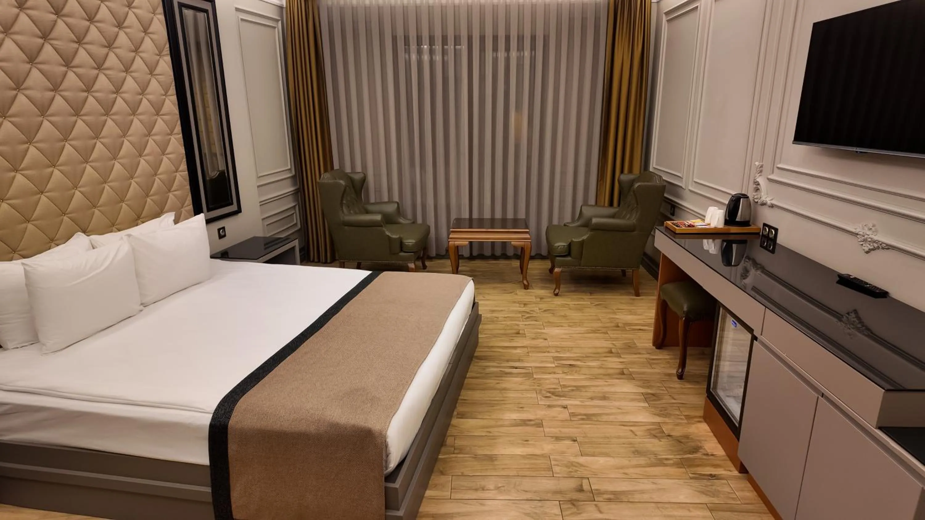 Bed in Lala Grand Hotel