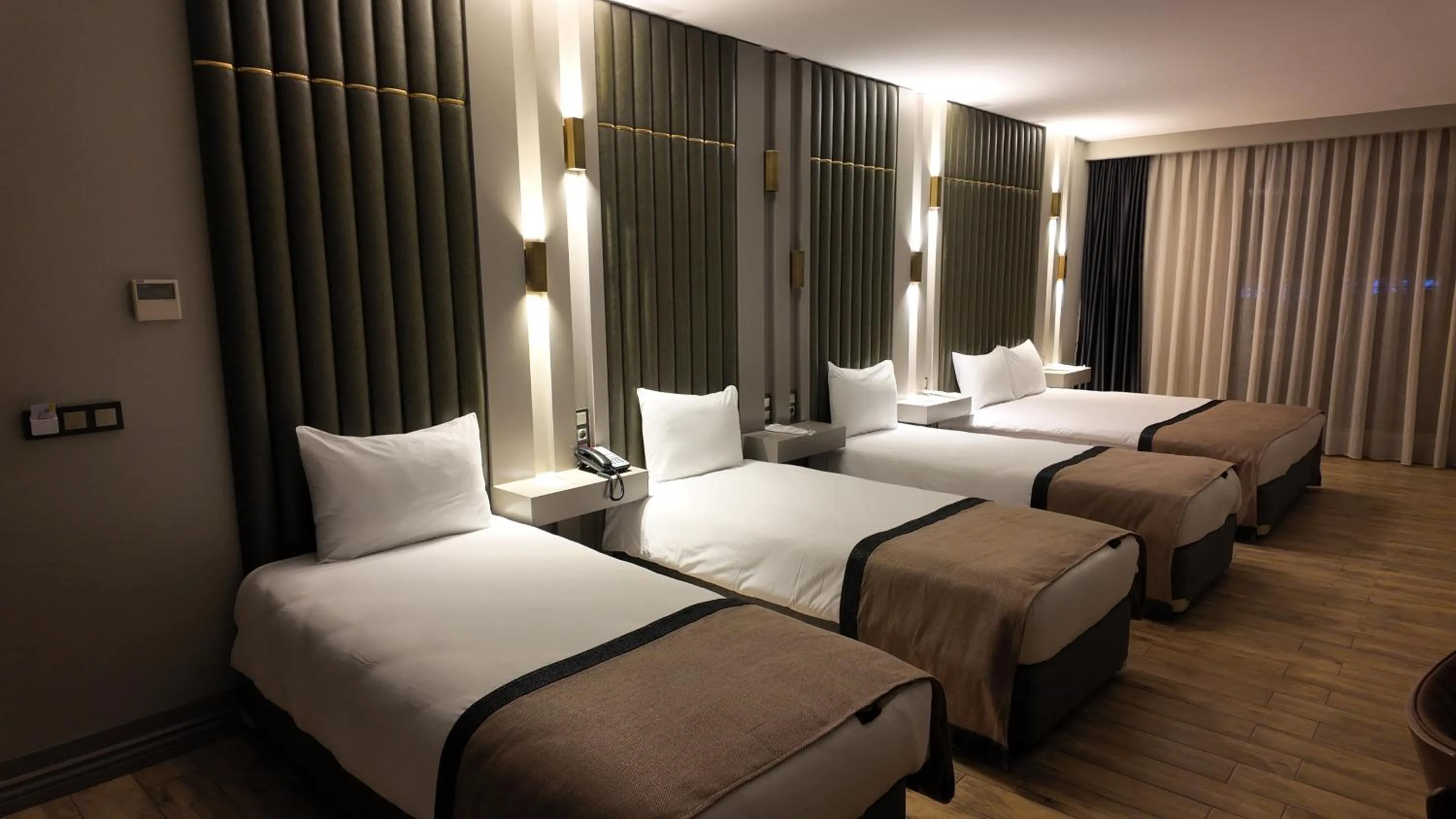 Bed in Lala Grand Hotel