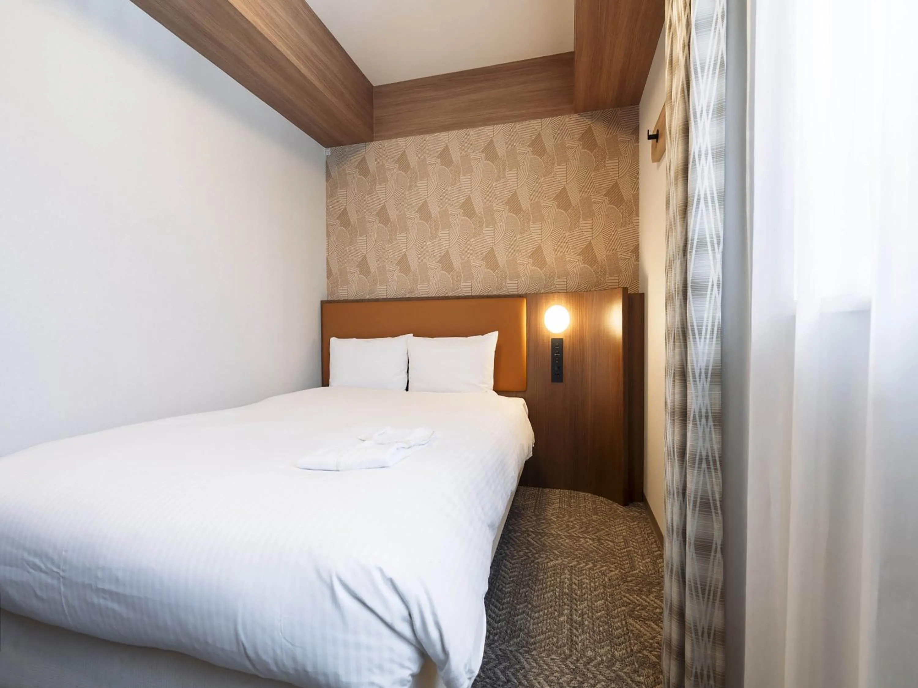 Bed in Richmond Hotel Sapporo Odori