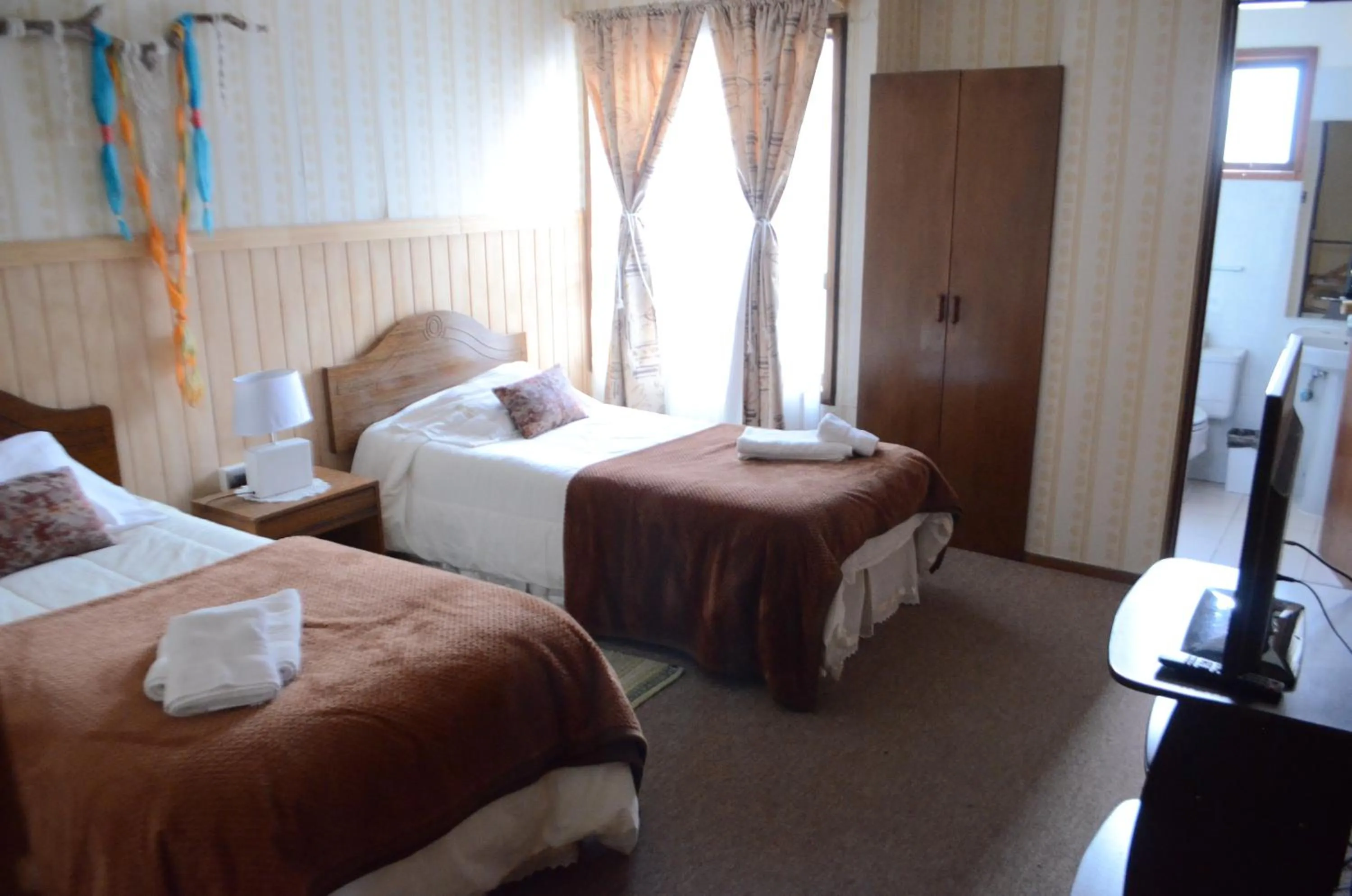 Bed in Hostal Los Pinos