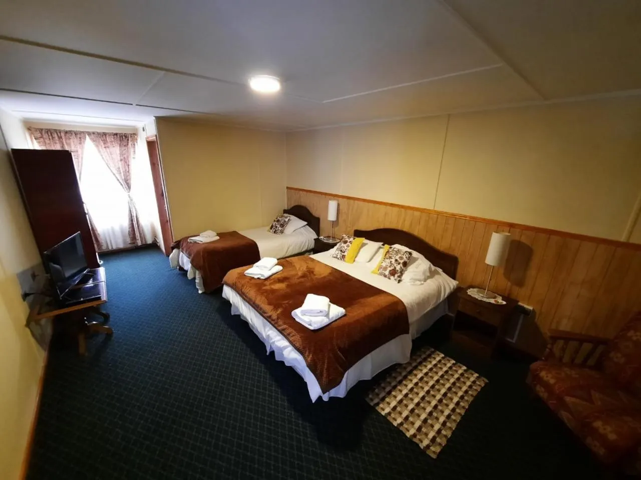 Bed in Hostal Los Pinos