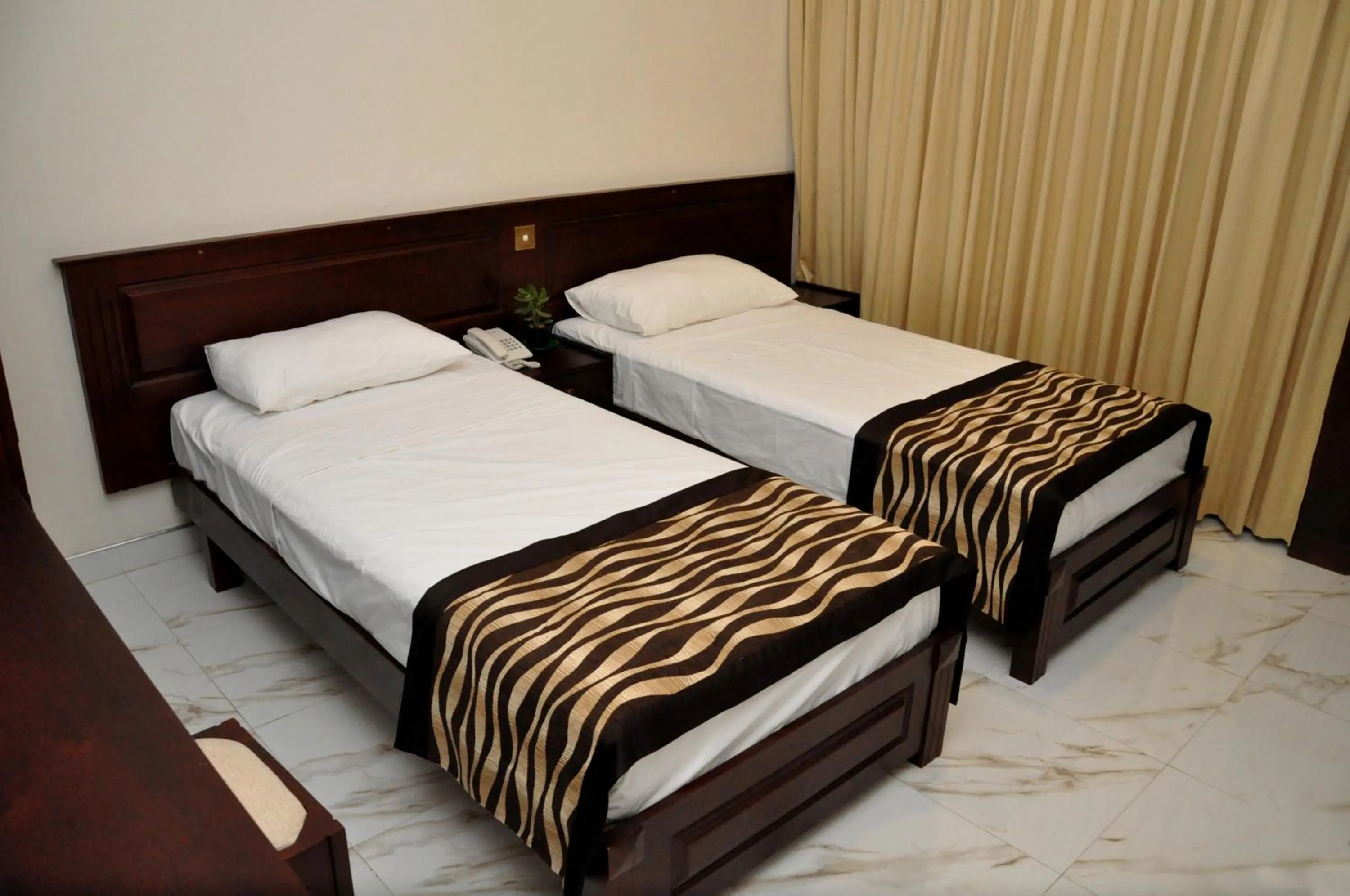 Bed in Cafe Aroma Inn