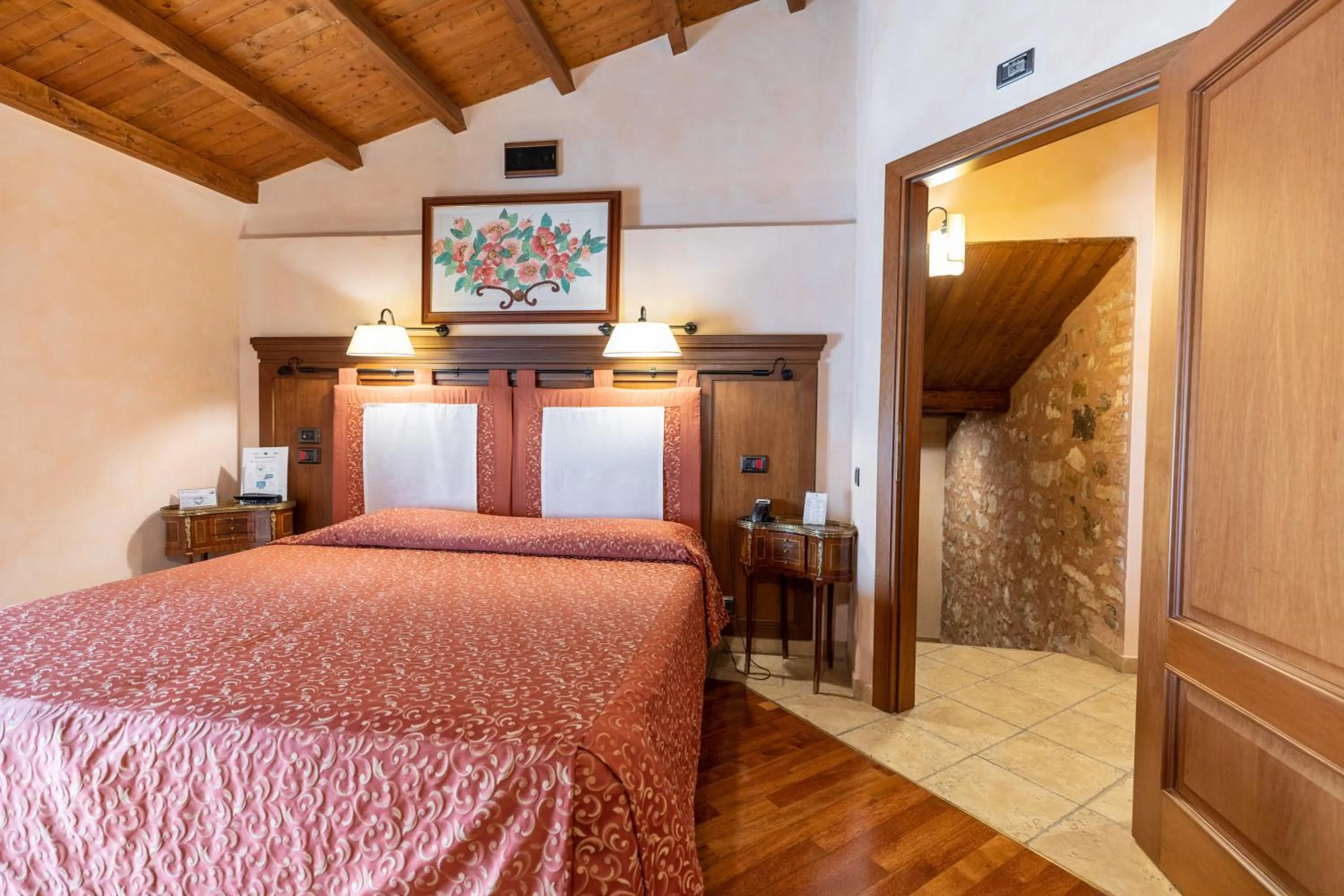 Bedroom, Bed in Relais Abbazia Santa Anastasia Resort & Winery