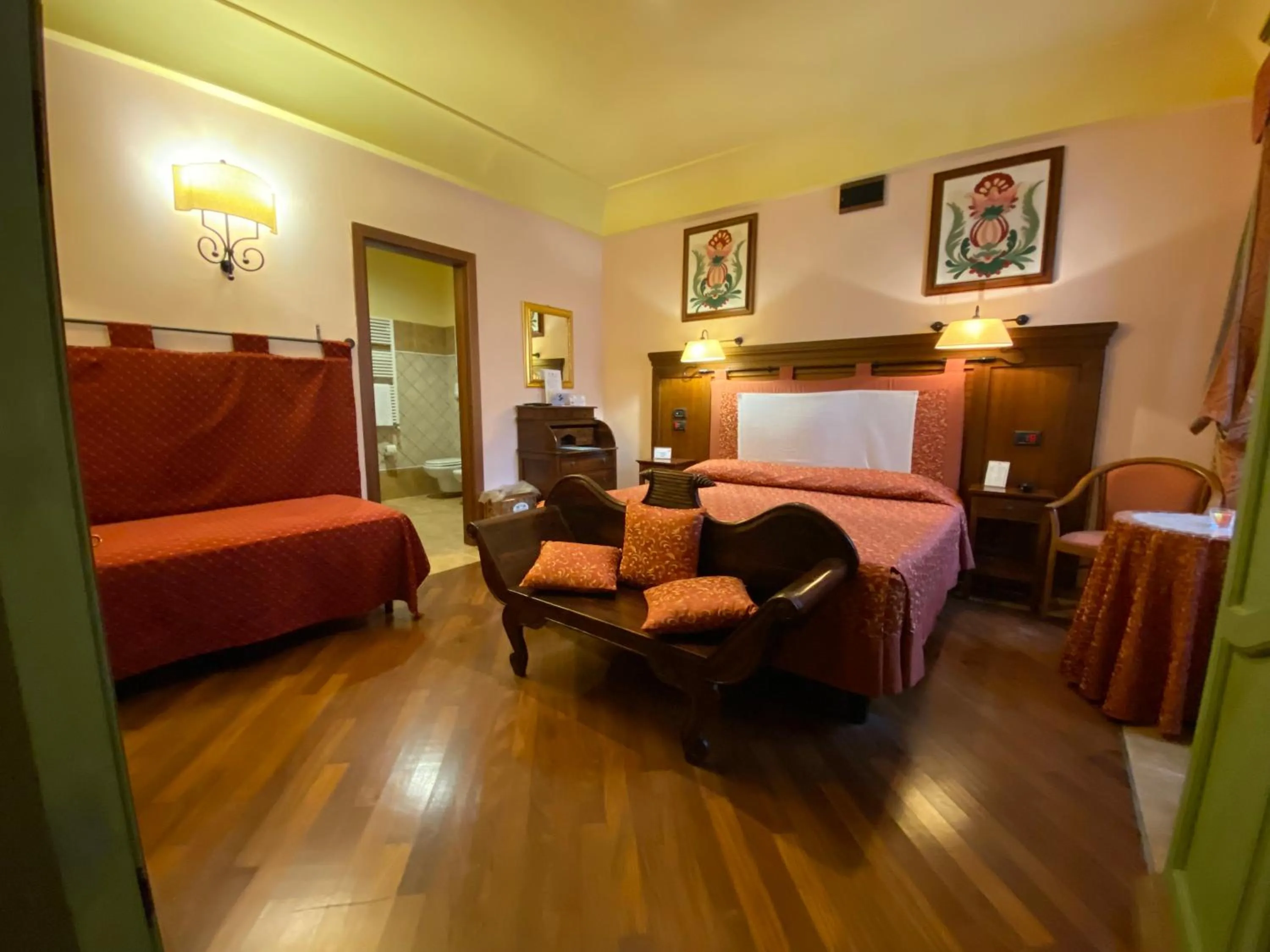 Photo of the whole room, Bed in Relais Abbazia Santa Anastasia Resort & Winery