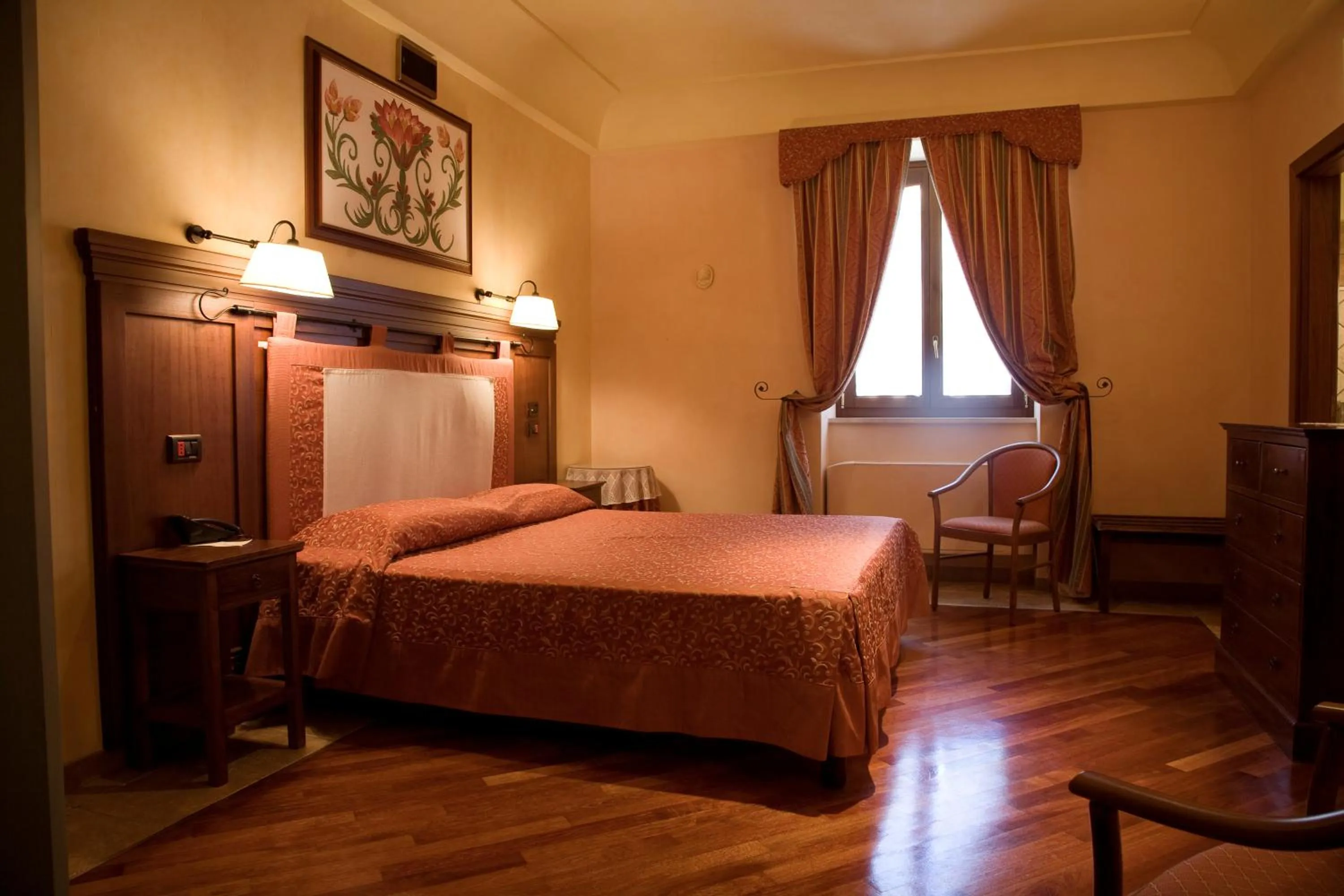 Bed in Relais Abbazia Santa Anastasia Resort & Winery