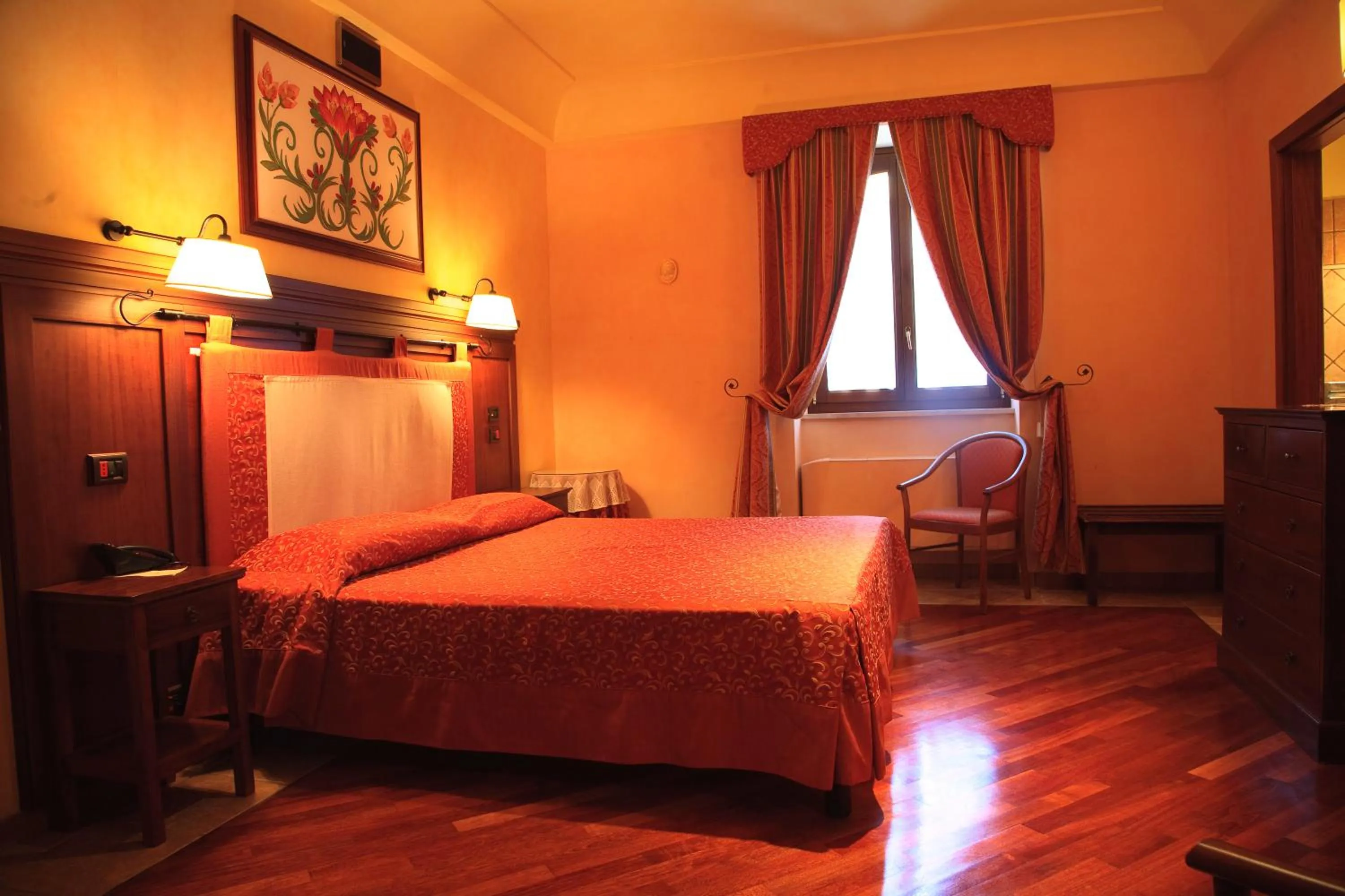 Bed in Relais Abbazia Santa Anastasia Resort & Winery