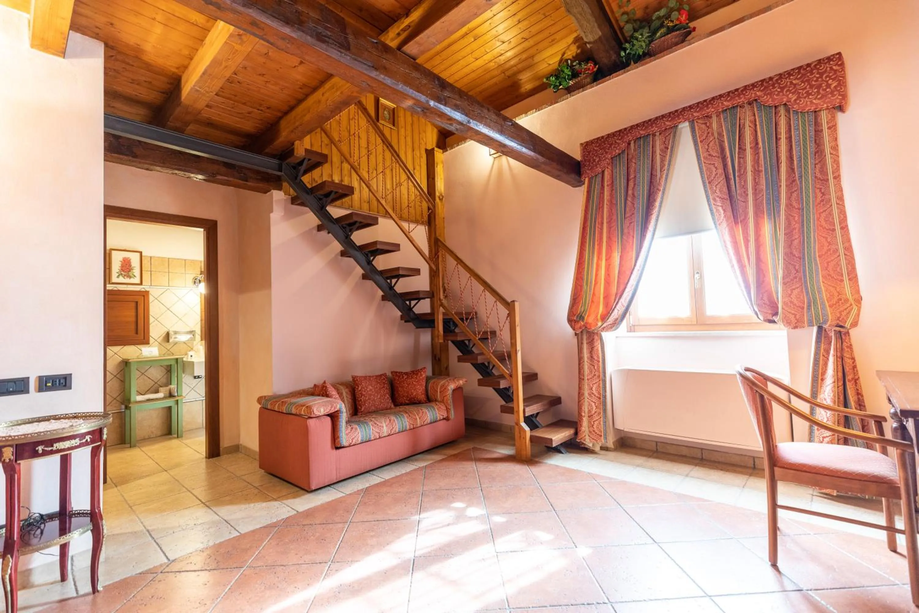 Living room in Relais Abbazia Santa Anastasia Resort & Winery