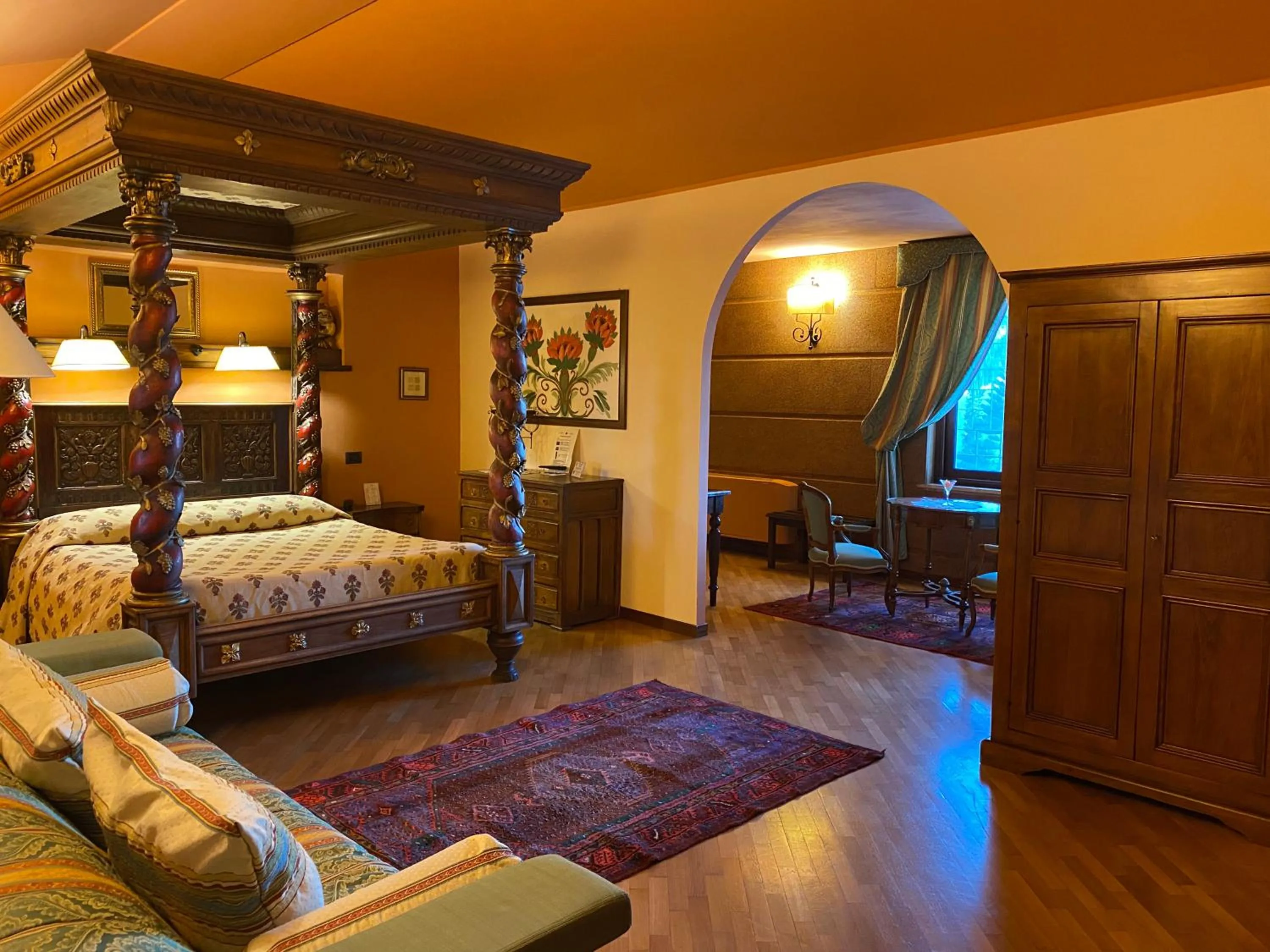 Living room, Bed in Relais Abbazia Santa Anastasia Resort & Winery