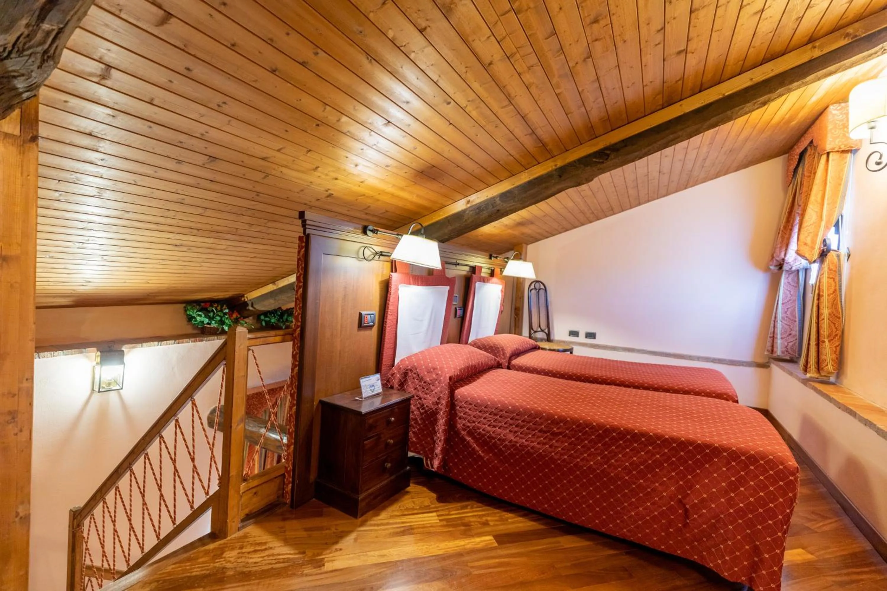 Bed in Relais Abbazia Santa Anastasia Resort & Winery