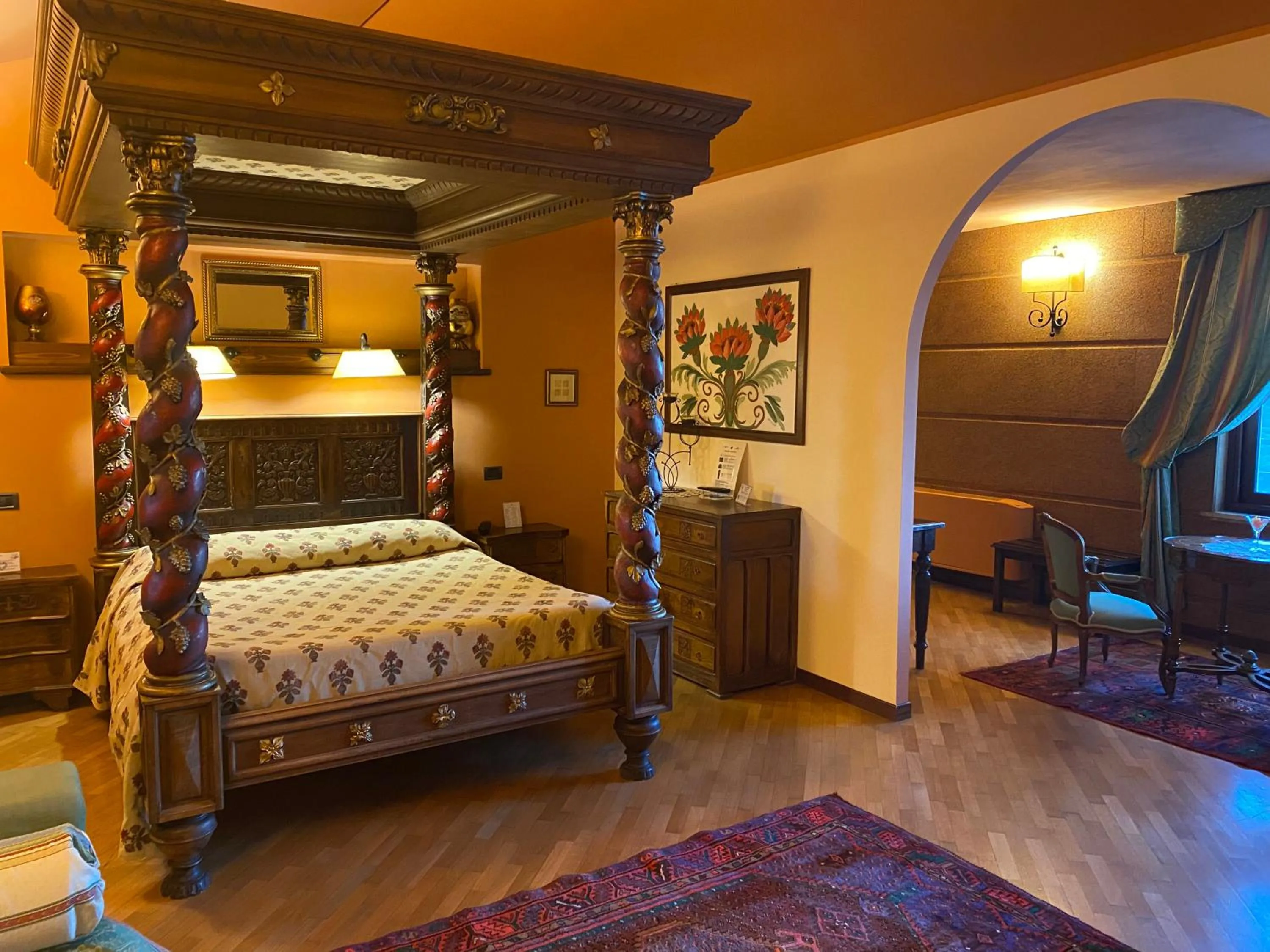 Bed in Relais Abbazia Santa Anastasia Resort & Winery