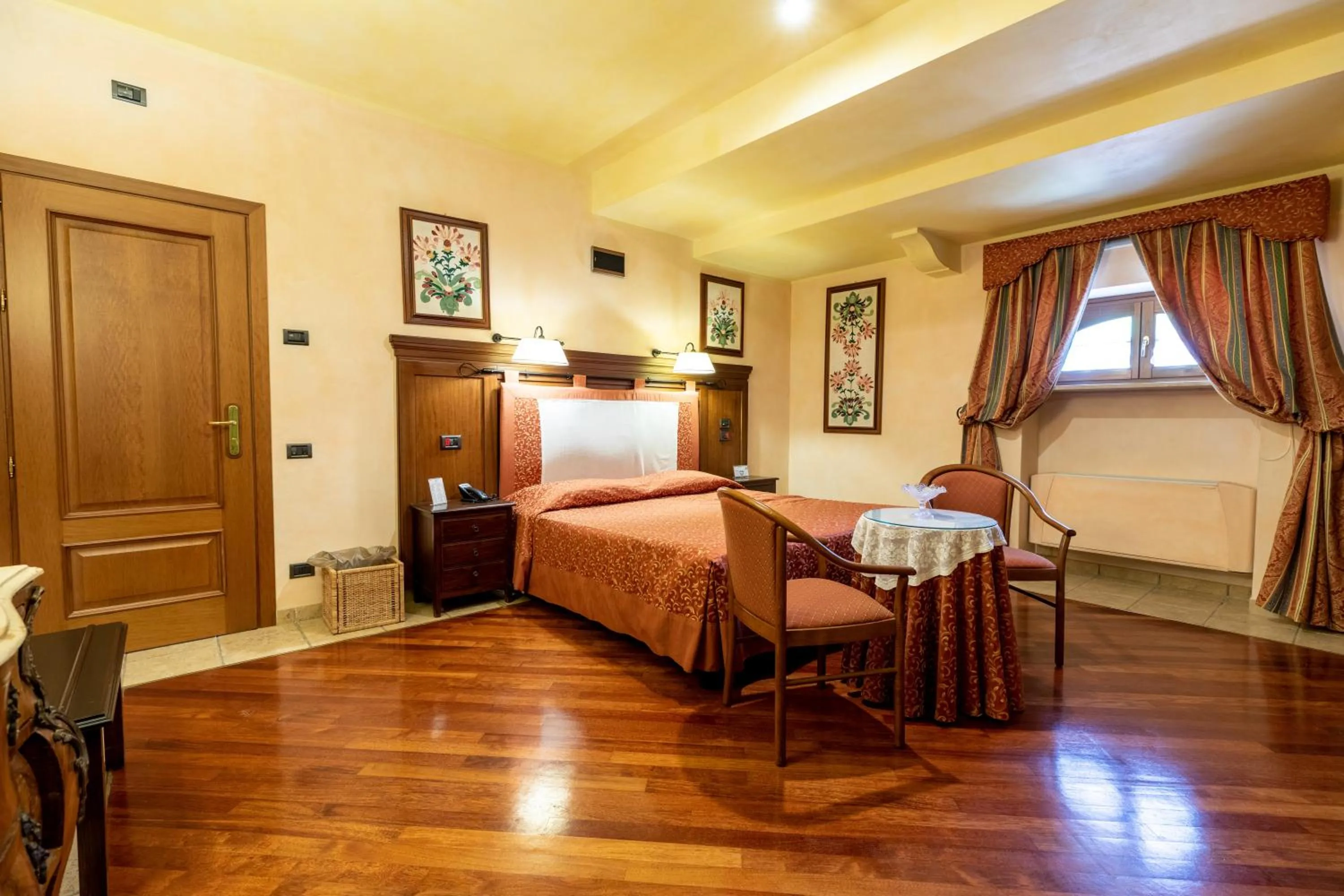 Bedroom, Bed in Relais Abbazia Santa Anastasia Resort & Winery