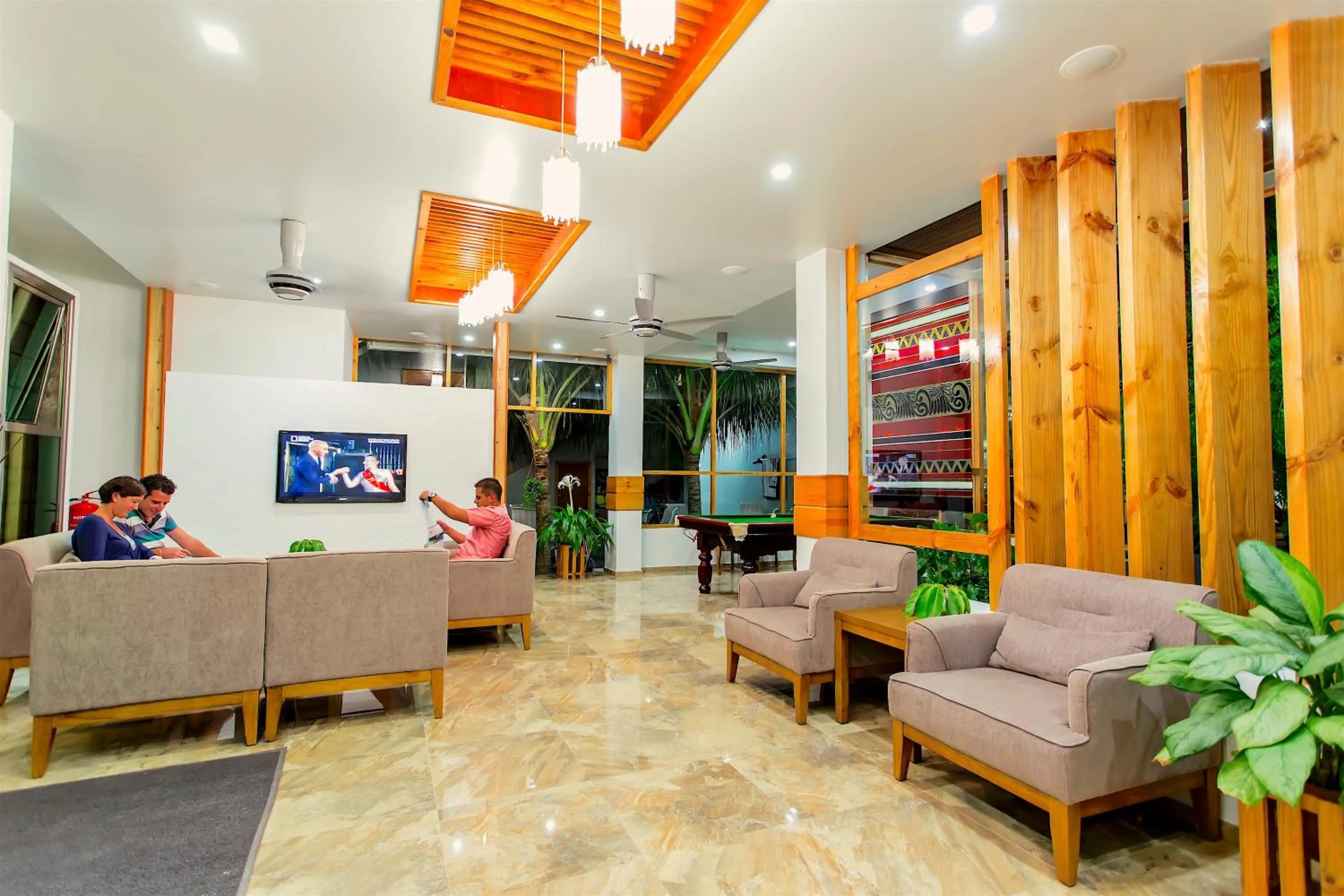 Communal lounge/ TV room in Kaani Village & Spa