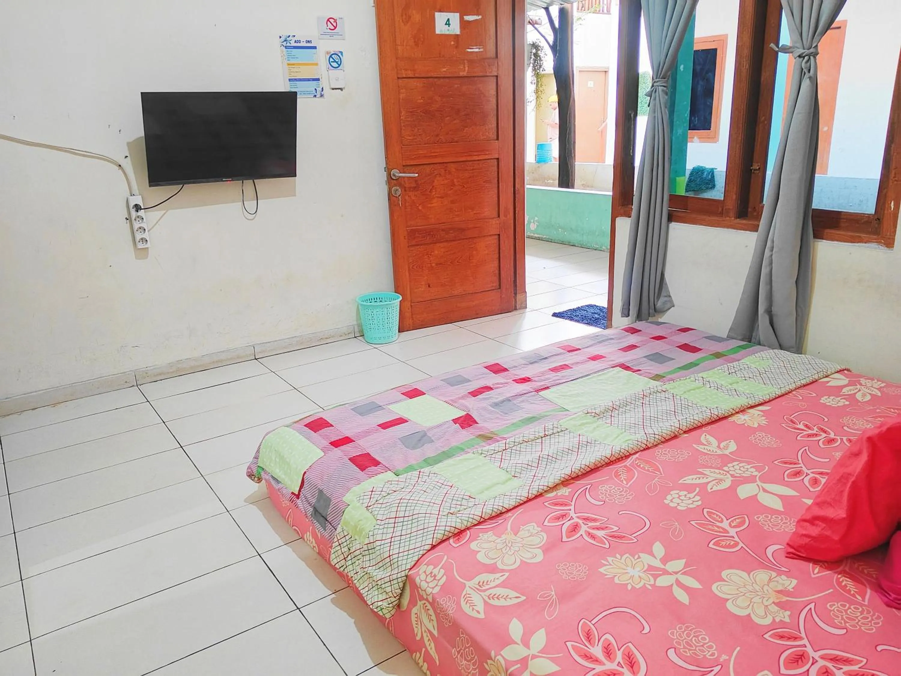 Bed in Homey Guesthouse Kertajaya (Syariah)