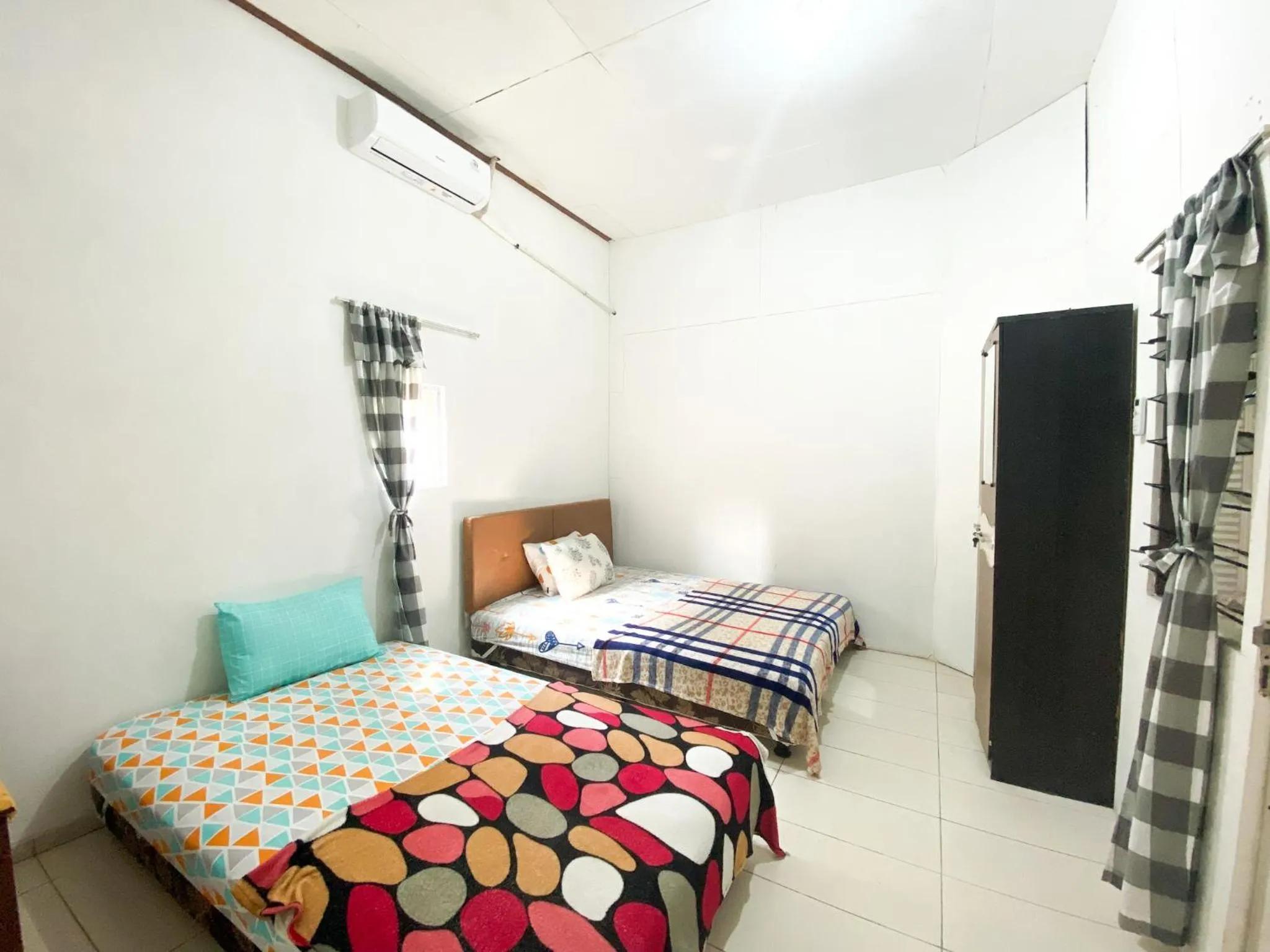 Bedroom, Bed in Homey Guesthouse Kertajaya (Syariah)