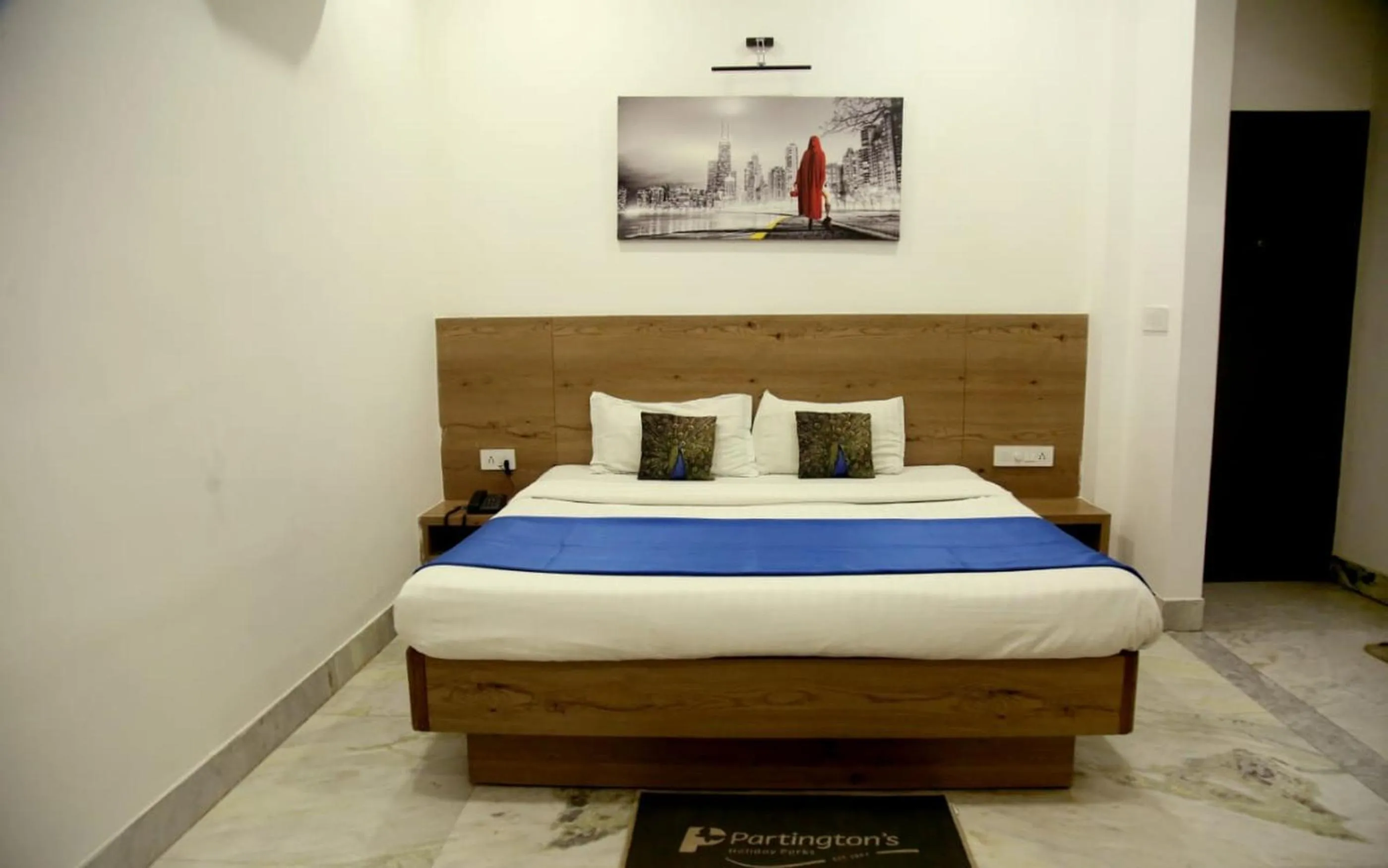 Photo of the whole room, Bed in Hotel Nisha Nest, Bhopal