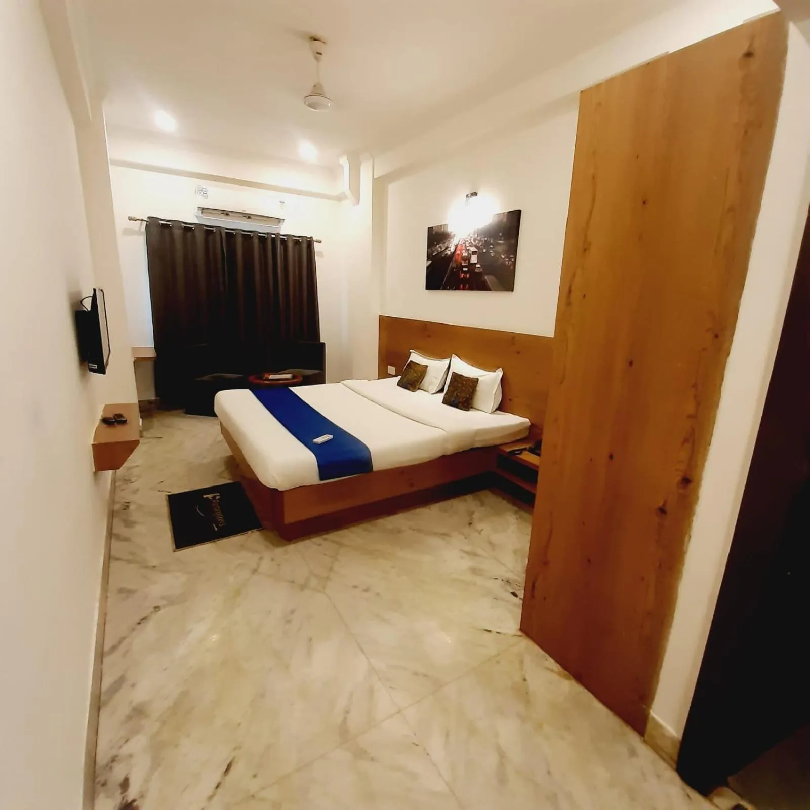 Photo of the whole room, Bed in Hotel Nisha Nest, Bhopal