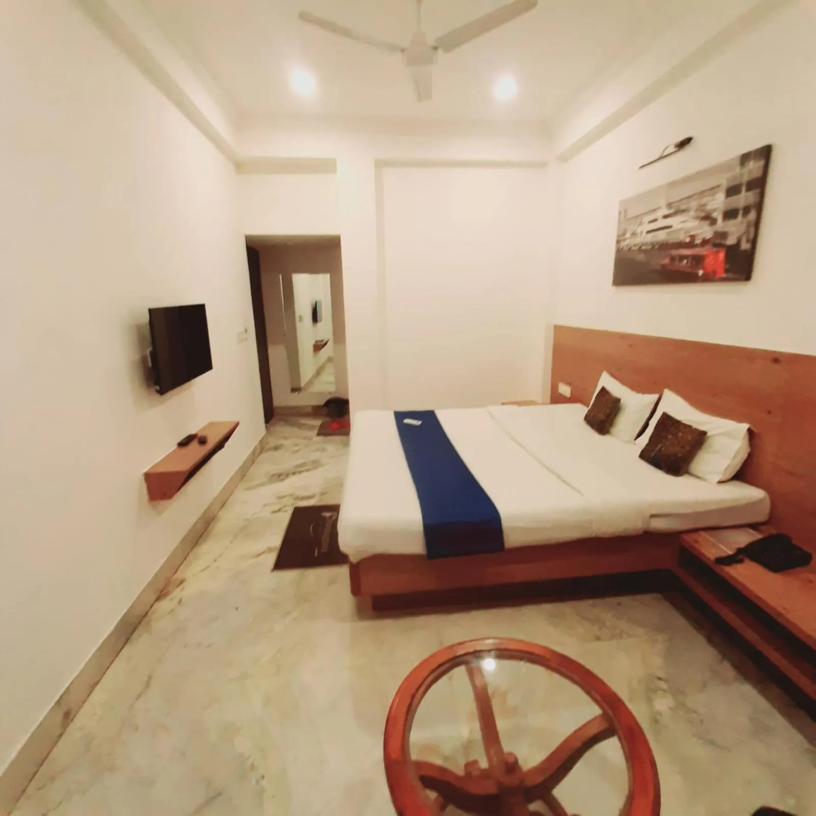 Photo of the whole room, Bed in Hotel Nisha Nest, Bhopal