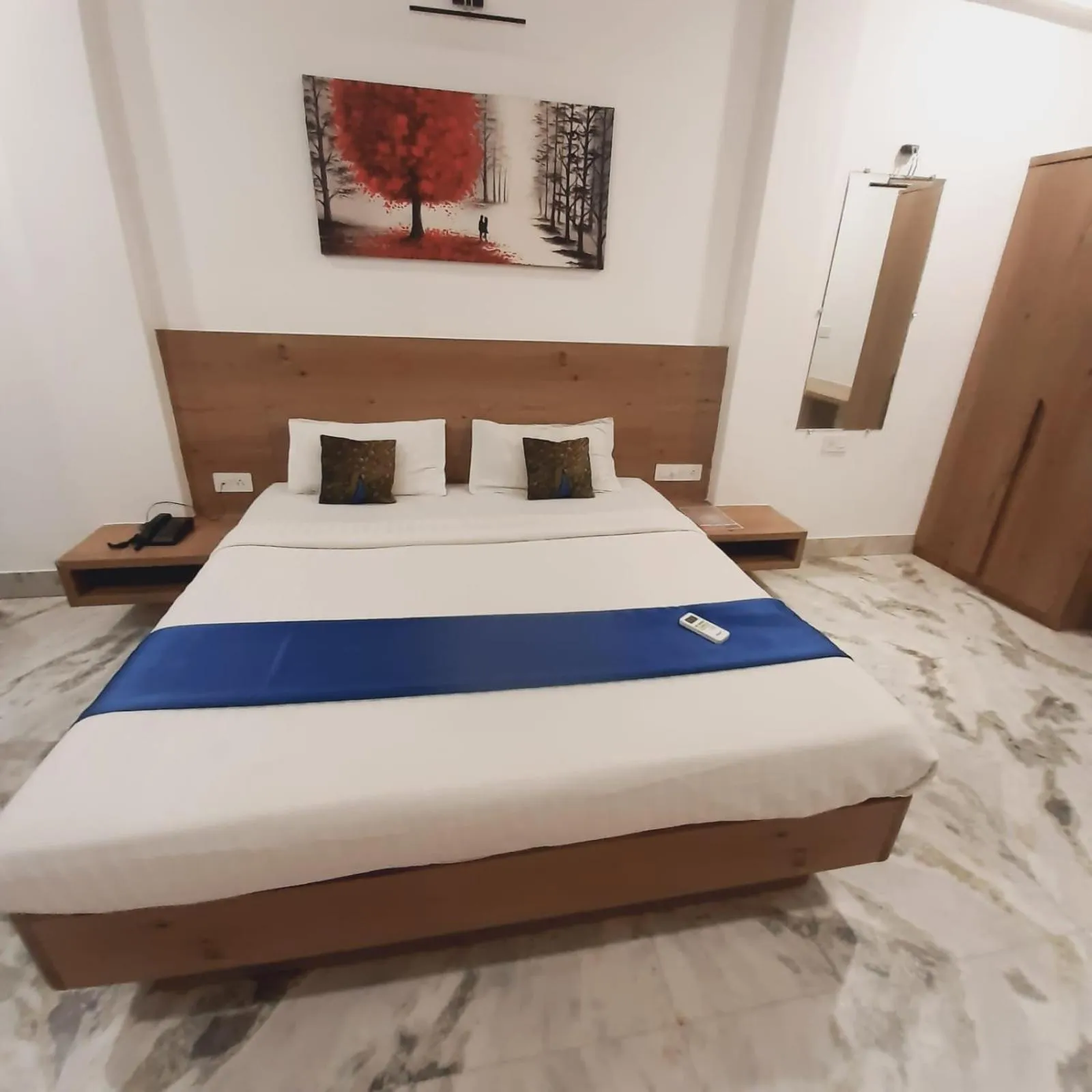 Photo of the whole room, Bed in Hotel Nisha Nest, Bhopal