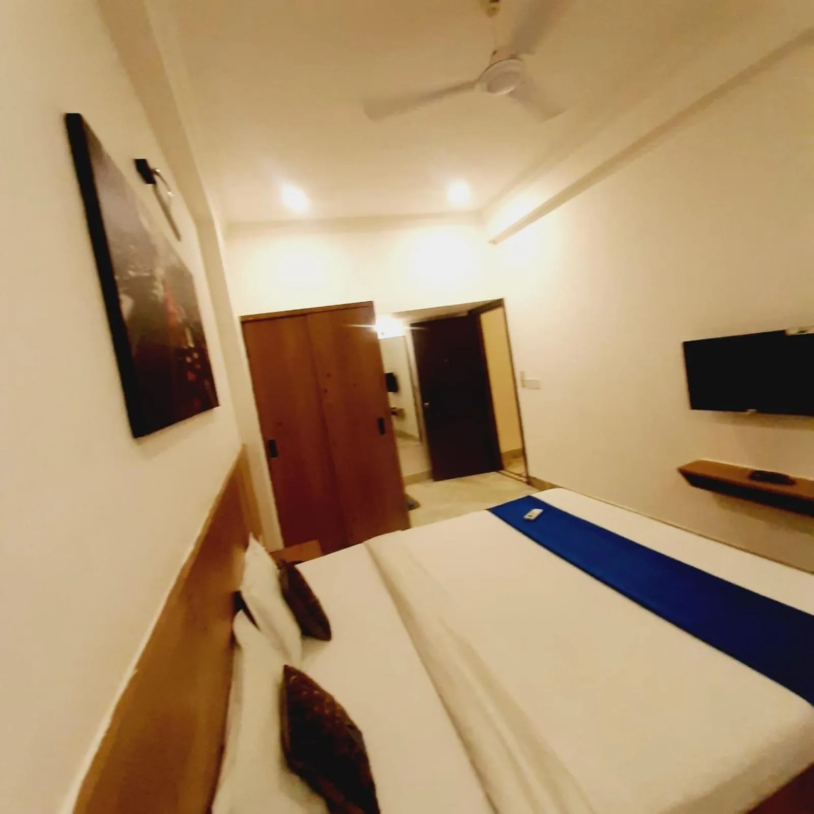 Photo of the whole room, Bed in Hotel Nisha Nest, Bhopal