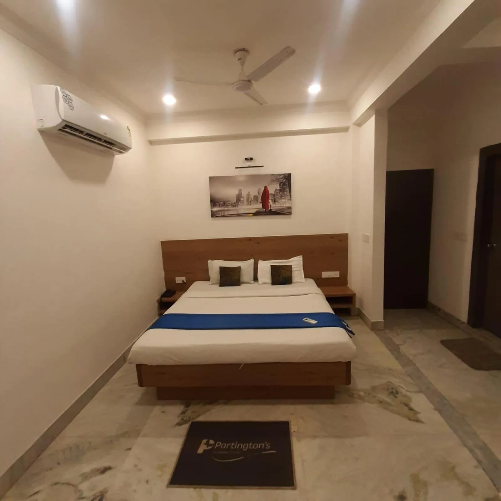 Photo of the whole room, Bed in Hotel Nisha Nest, Bhopal