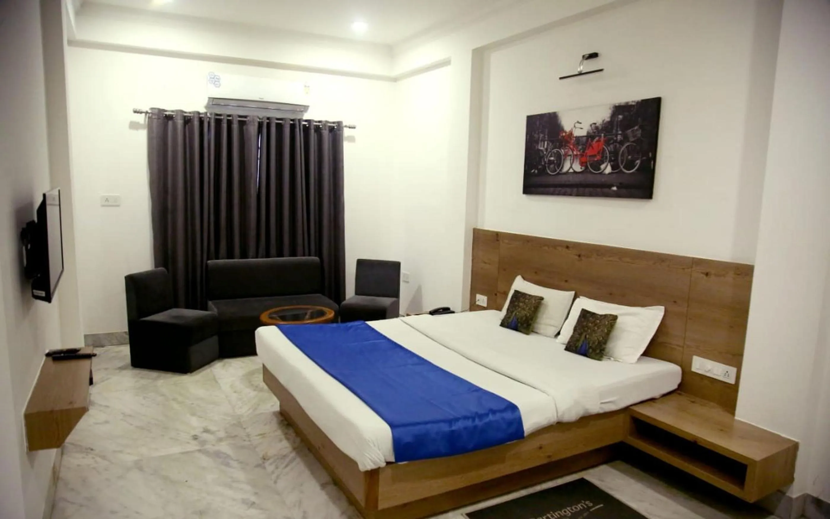 Photo of the whole room, Bed in Hotel Nisha Nest, Bhopal