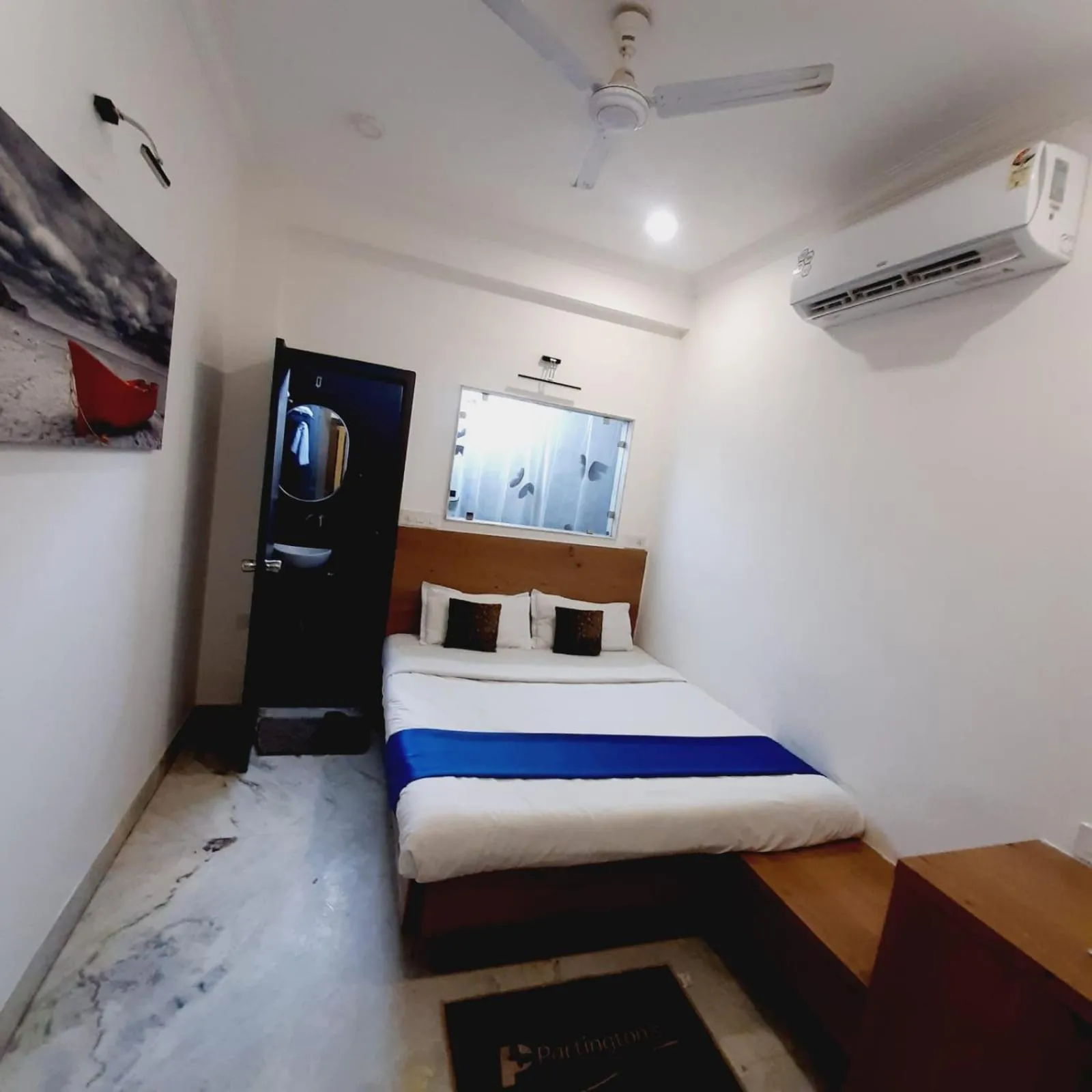 Photo of the whole room, Bed in Hotel Nisha Nest, Bhopal