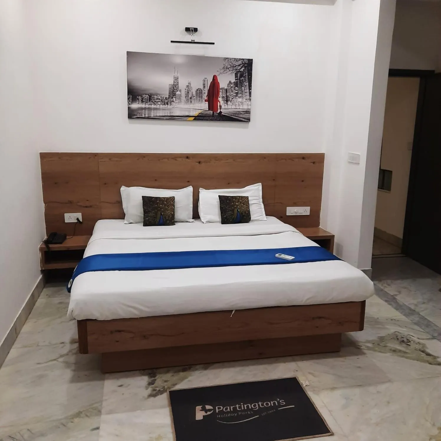 Photo of the whole room, Bed in Hotel Nisha Nest, Bhopal
