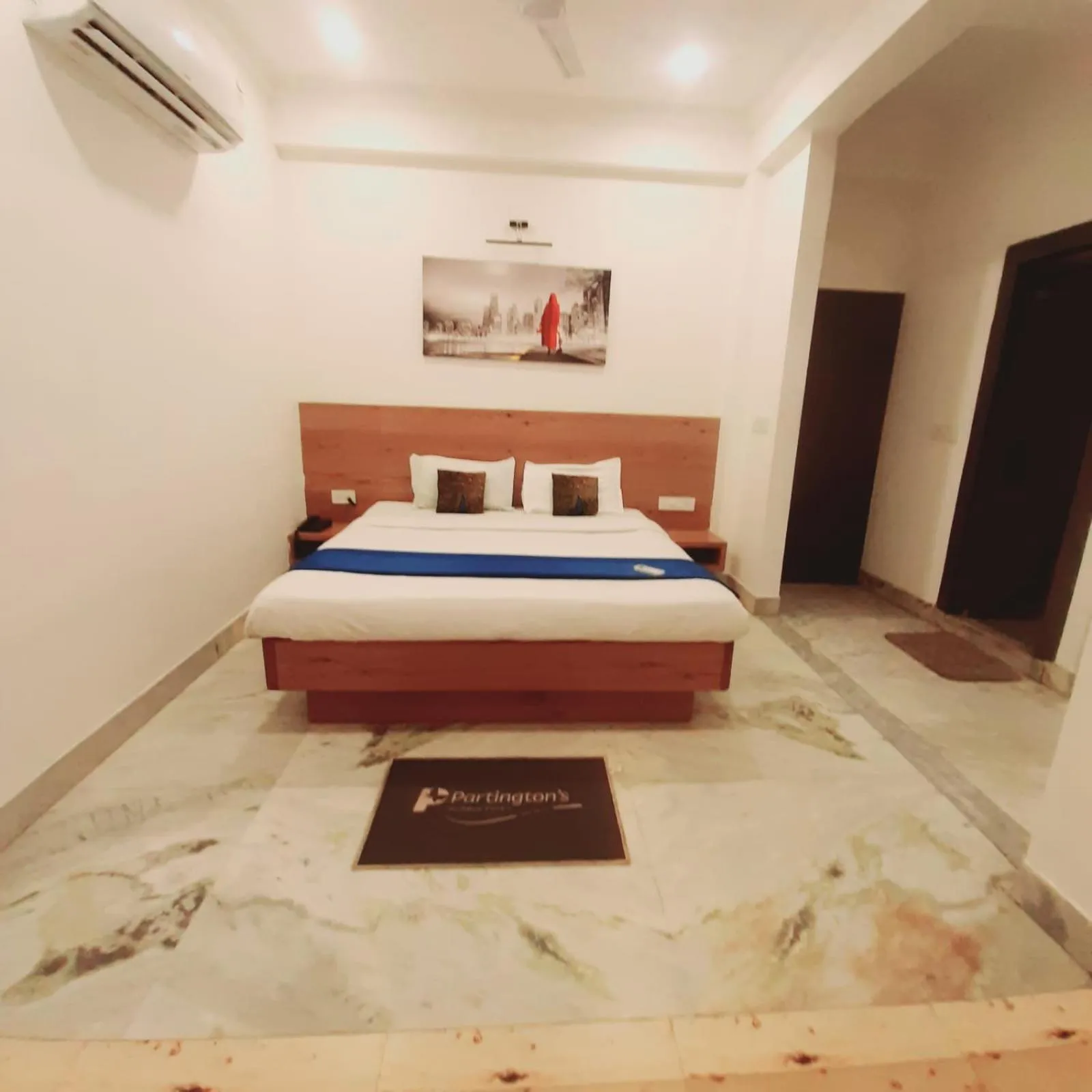 Photo of the whole room, Bed in Hotel Nisha Nest, Bhopal