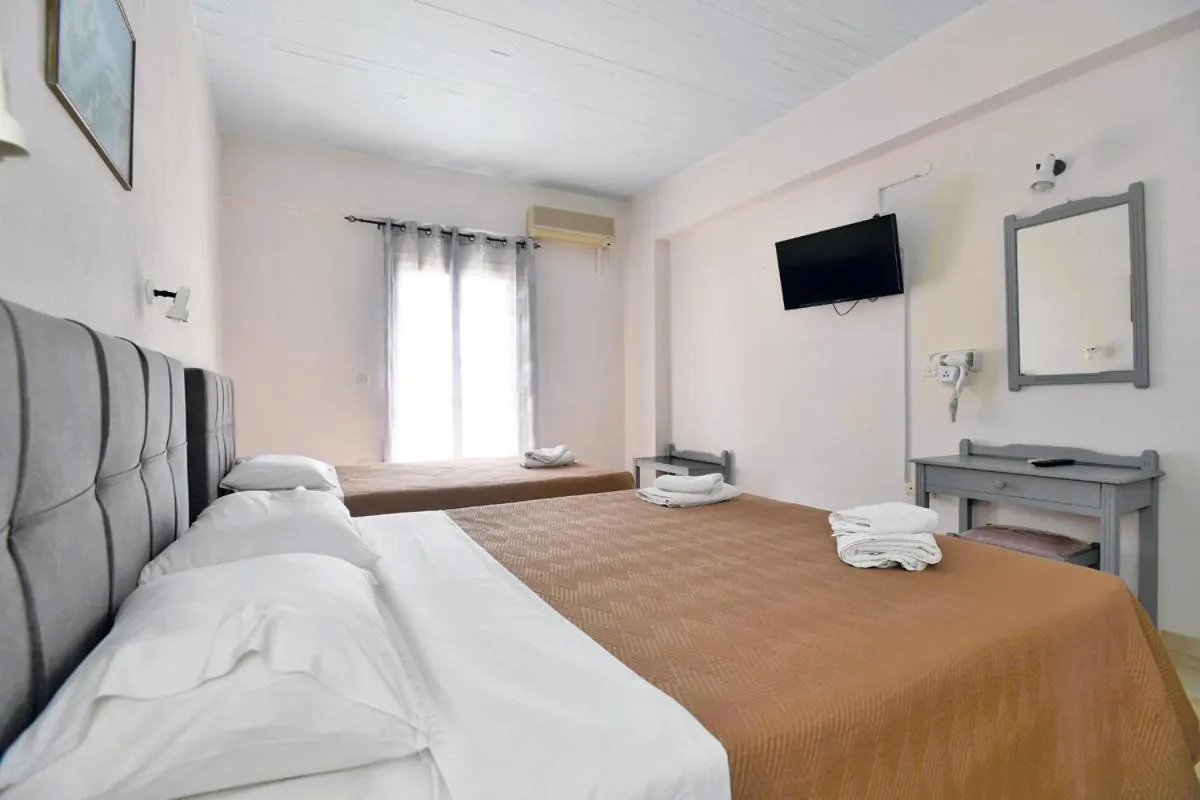 Bed in Vanas Apartments