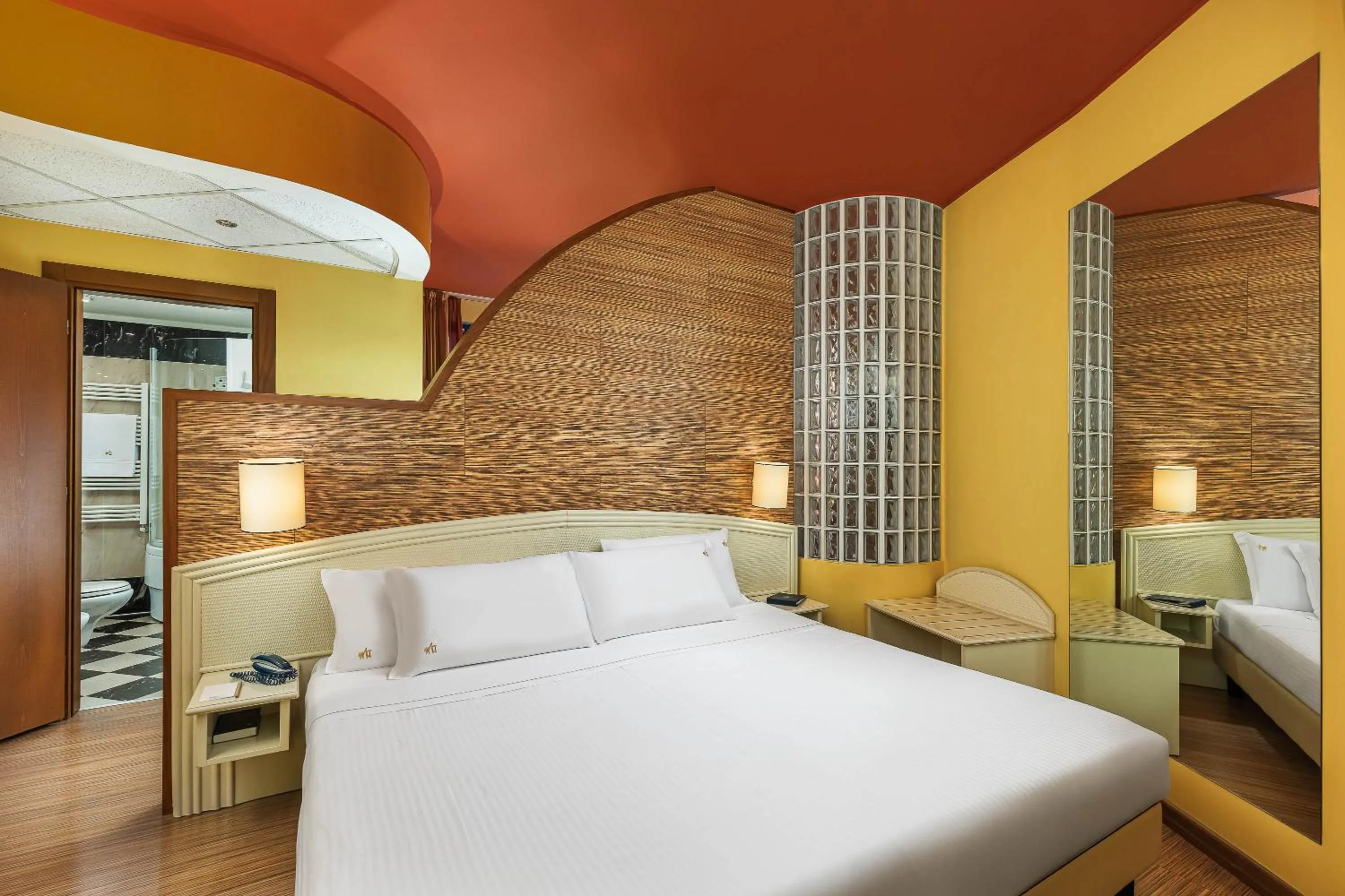 Bed in Welcome Hotel