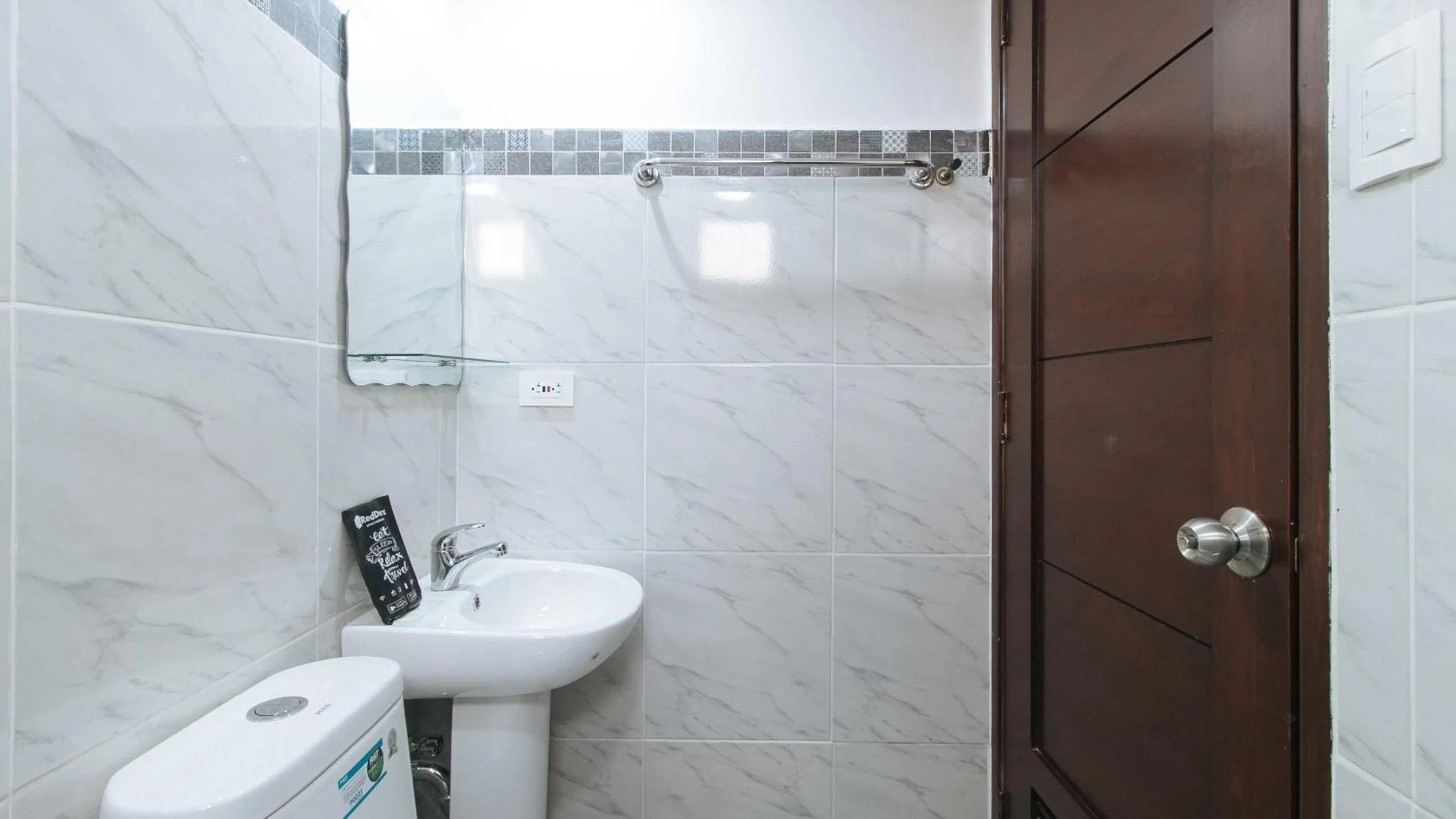 Shower in RedDoorz near UST Sampaloc Manila