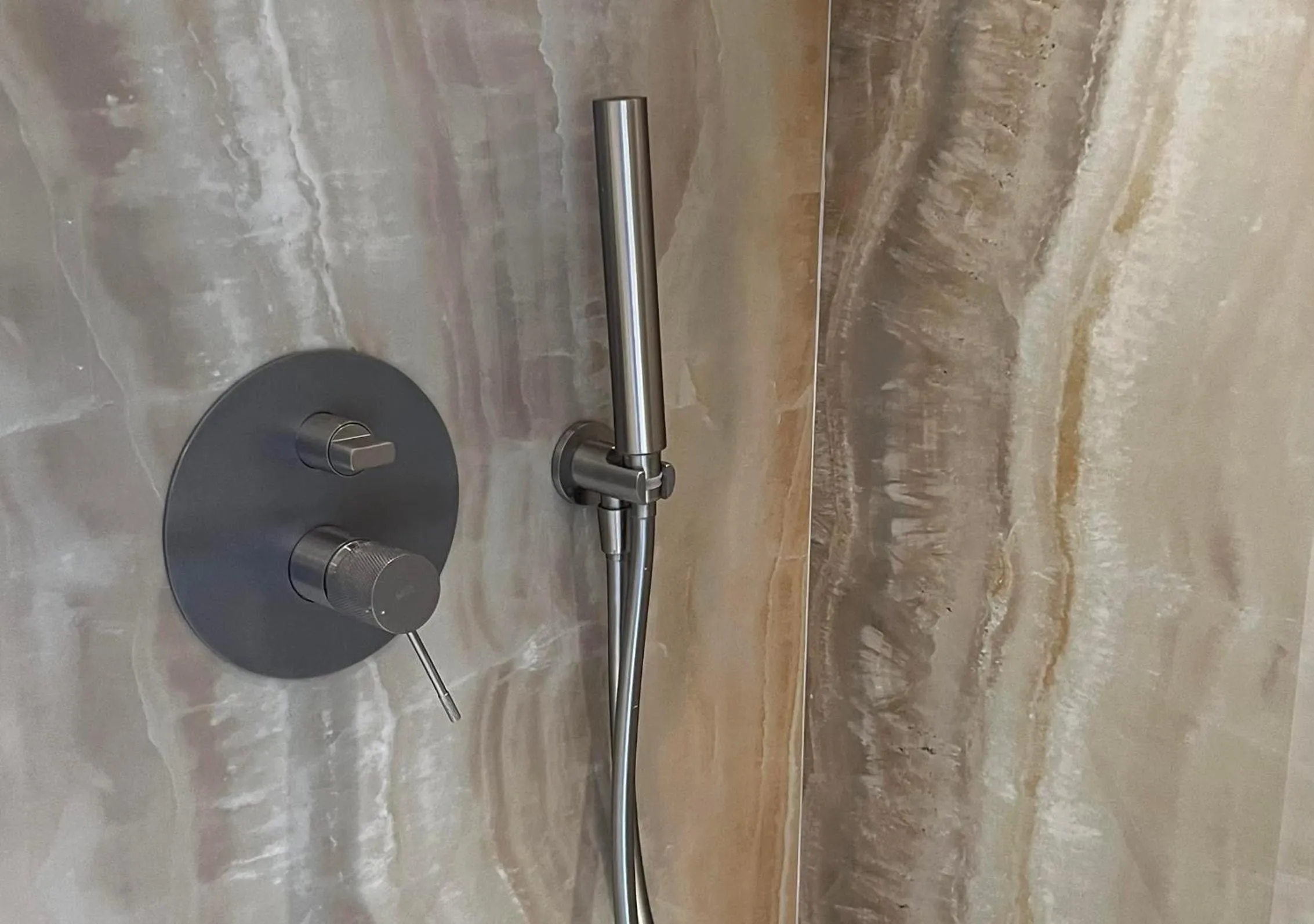 Shower in Comfy Studios Hotel