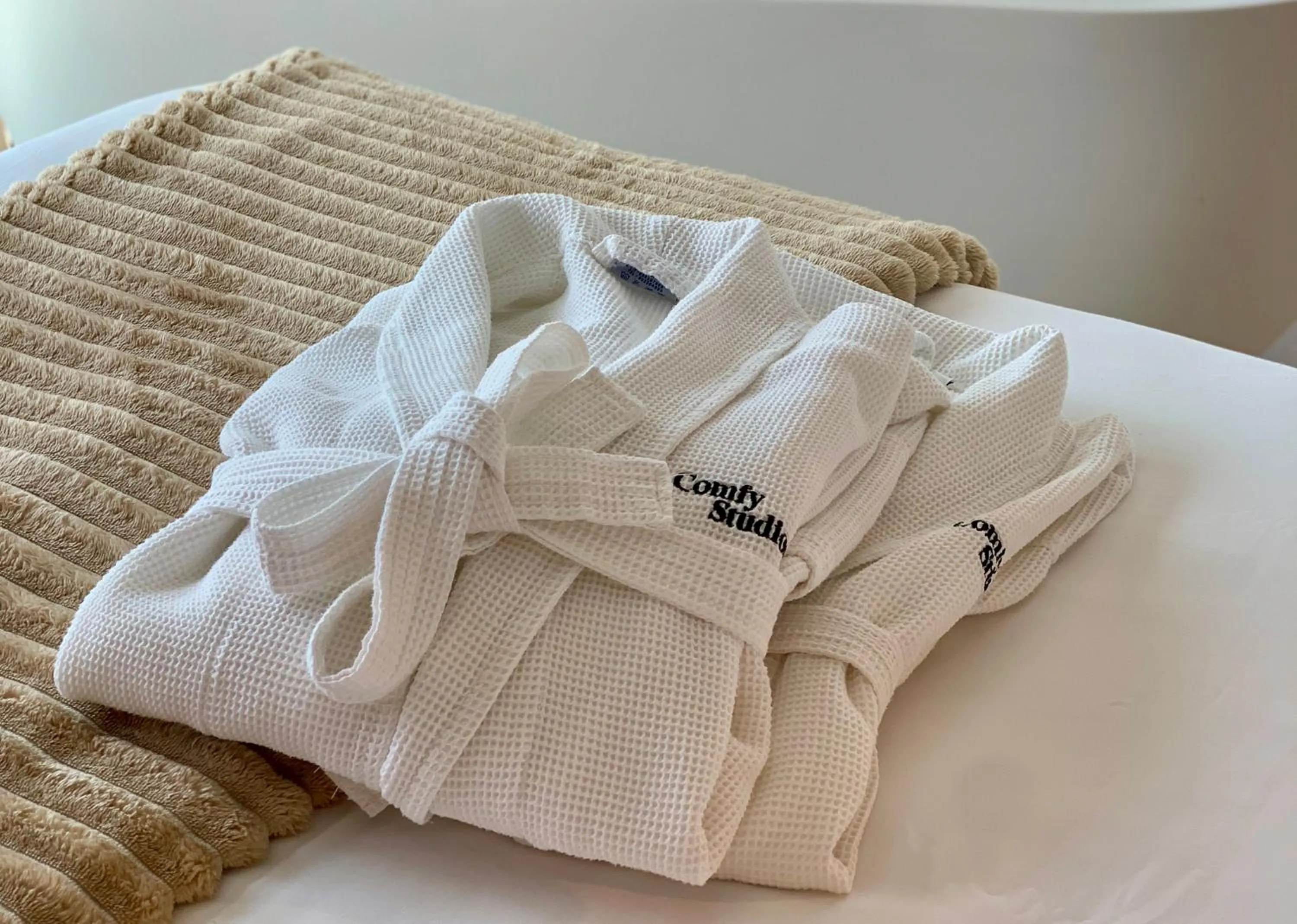 Property logo or sign in Comfy Studios Hotel