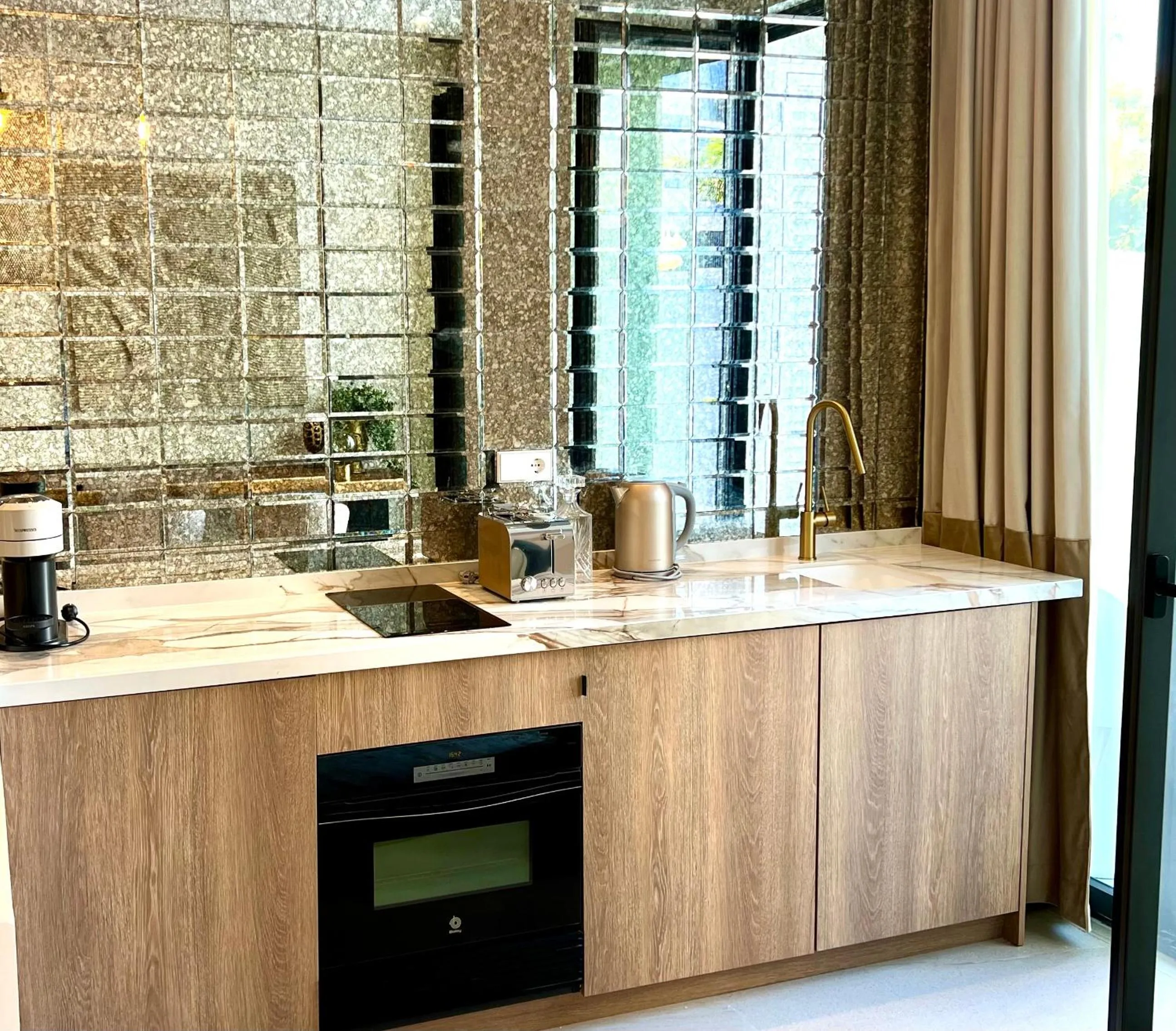 kitchen in Comfy Studios Hotel