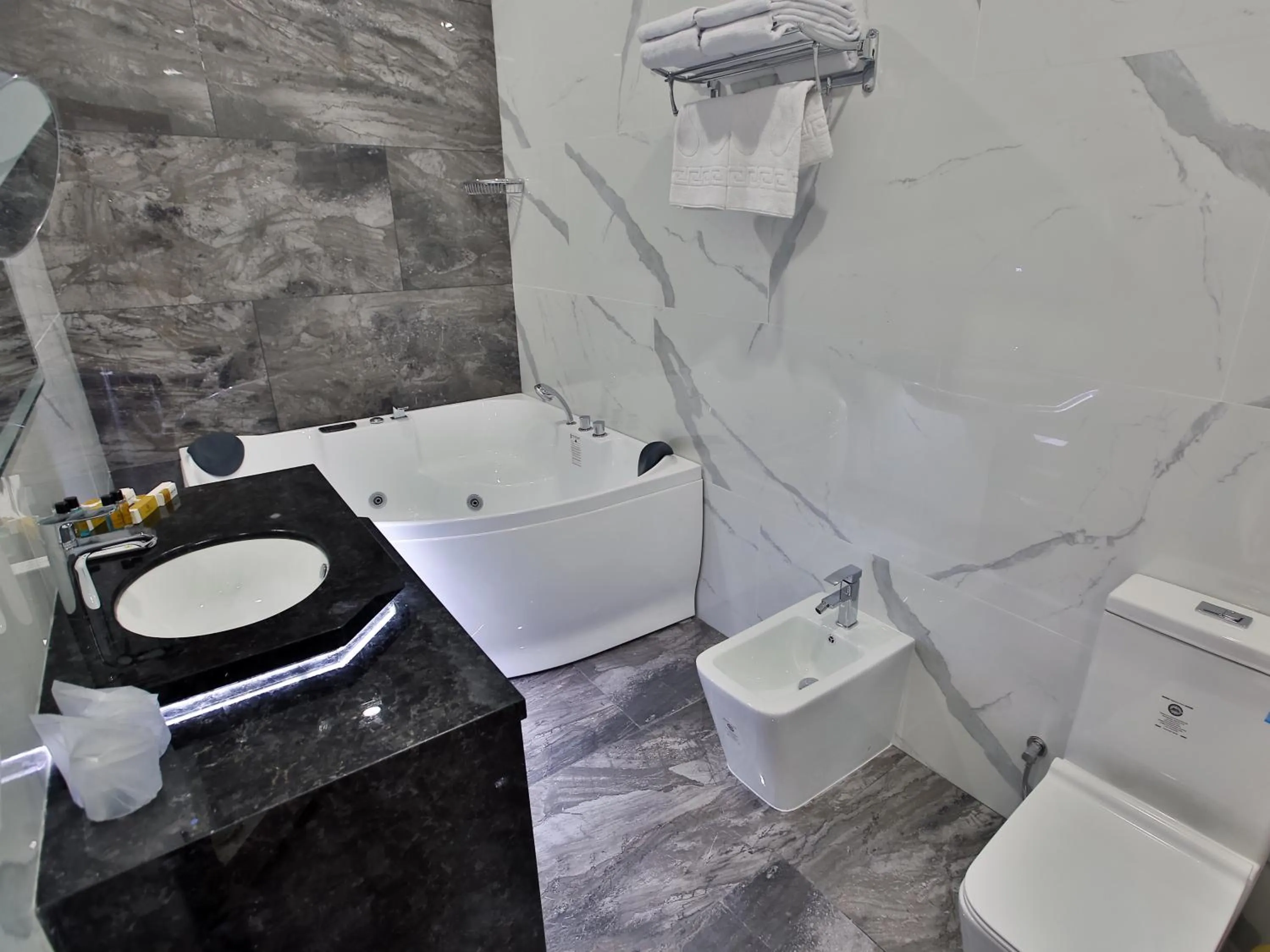 Bathroom in Paradise Plaza Luxury Hotel