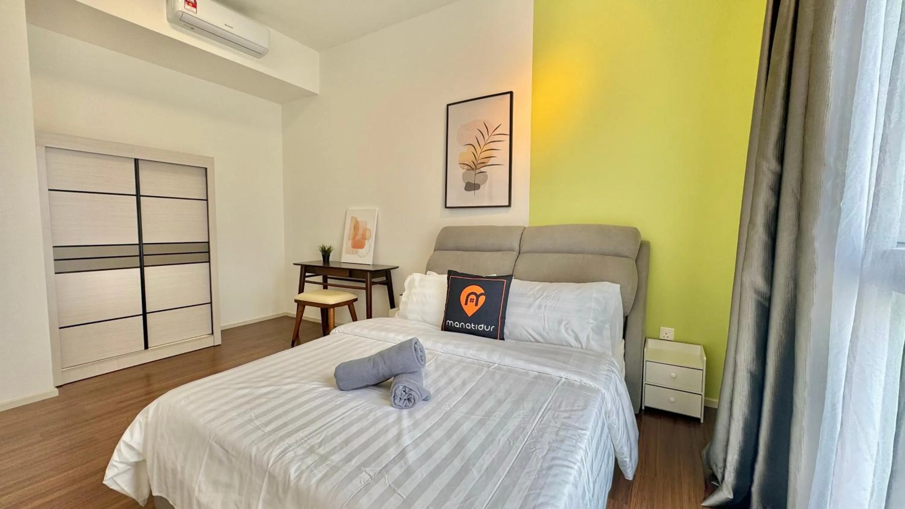 Photo of the whole room, Bed in UNA Serviced Apartment by manatidur