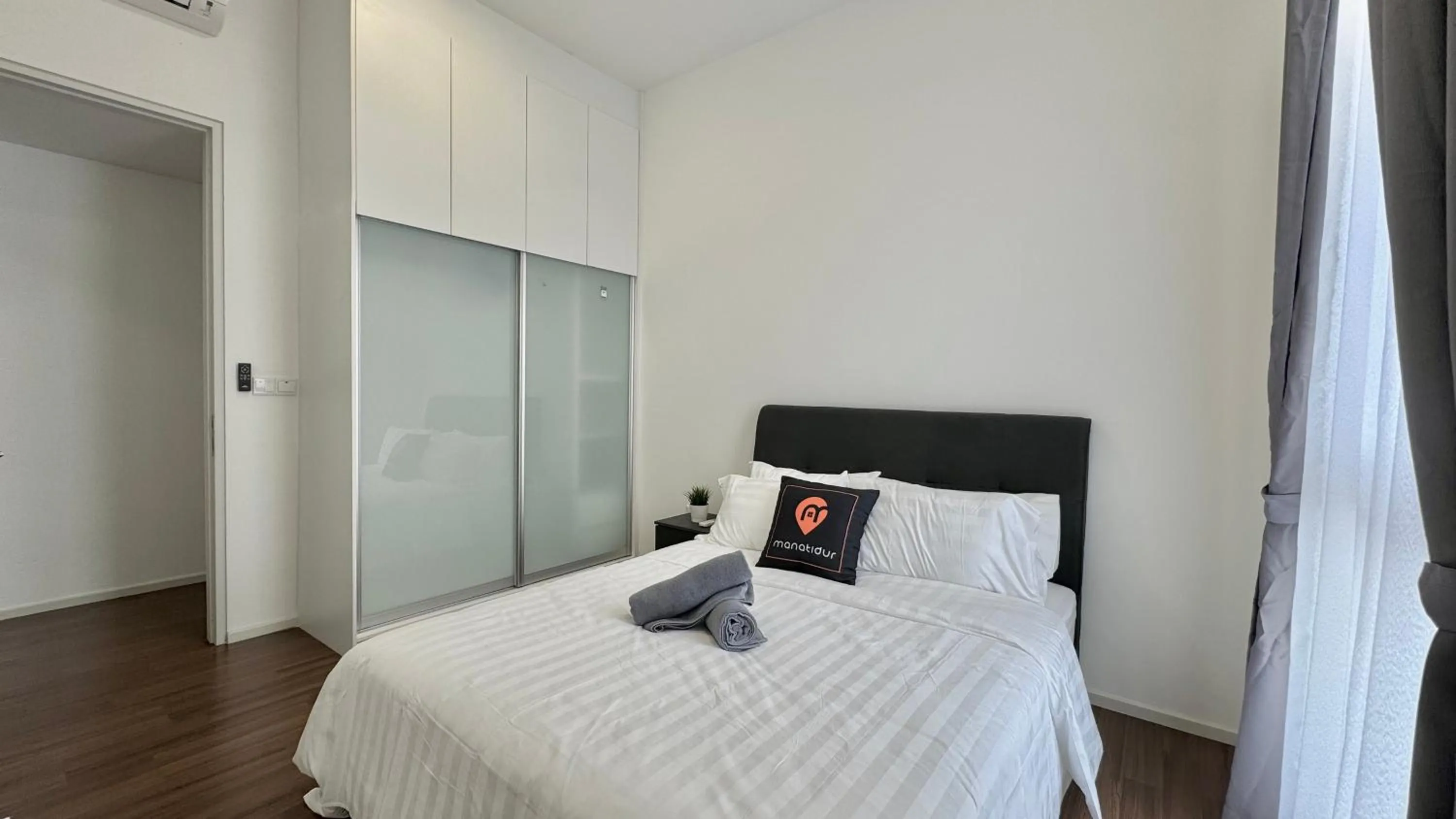Bed in UNA Serviced Apartment by manatidur