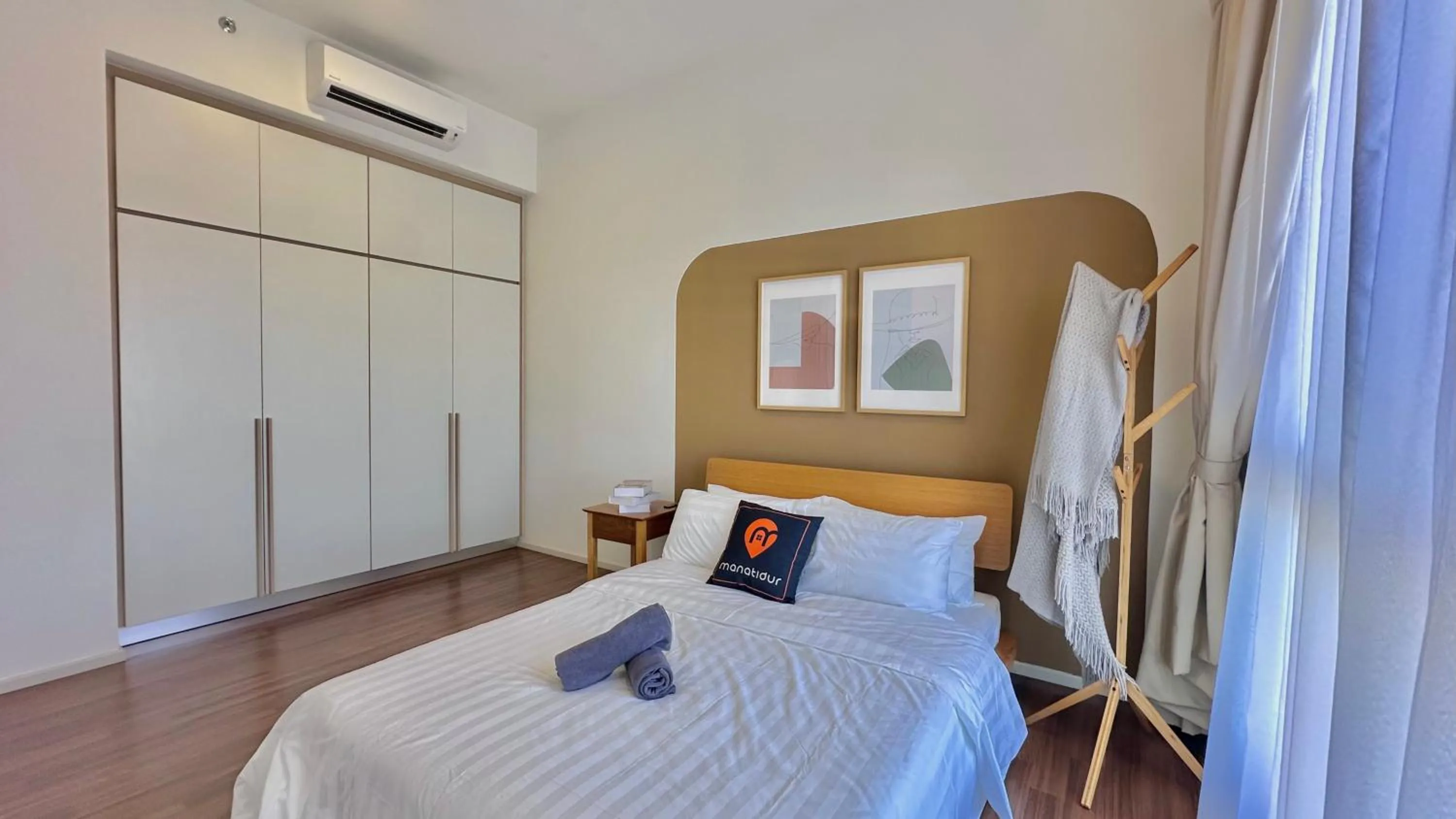 Photo of the whole room, Bed in UNA Serviced Apartment by manatidur