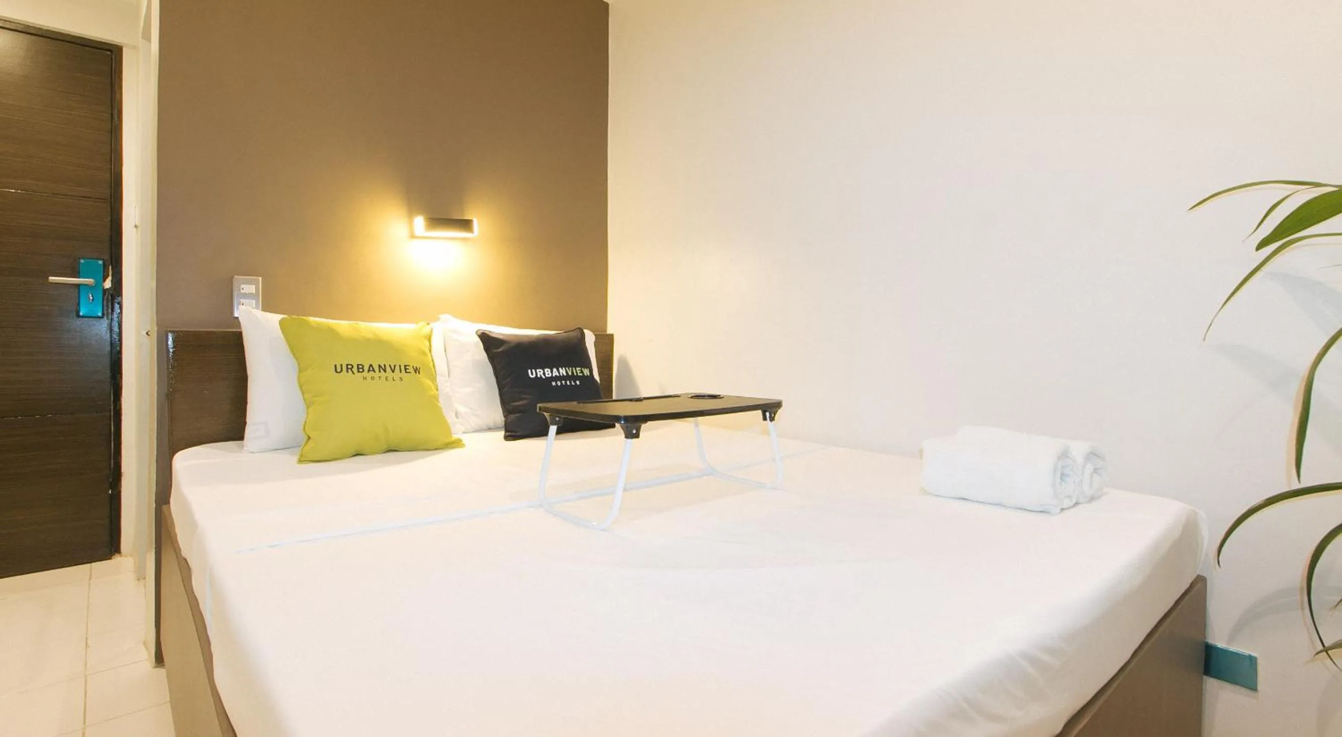 Photo of the whole room, Bed in UrbanView at San Antonio's Place Sampaloc Manila