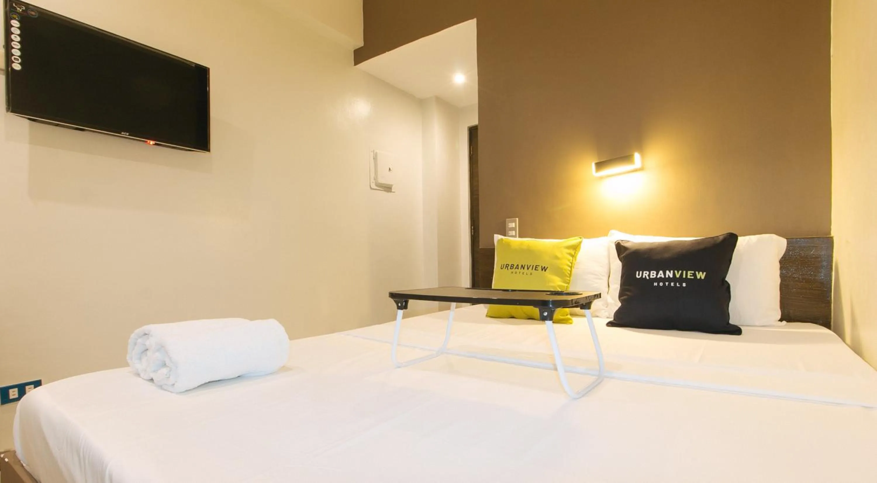 Bedroom, Bed in UrbanView at San Antonio's Place Sampaloc Manila