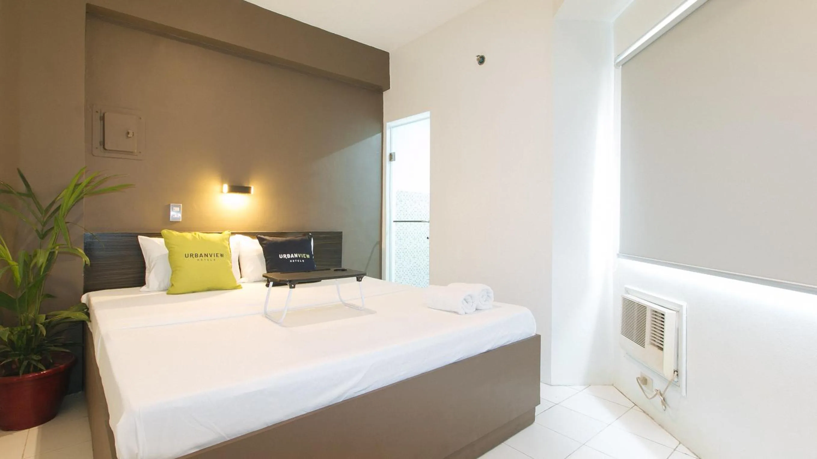 Photo of the whole room, Bed in UrbanView at San Antonio's Place Sampaloc Manila