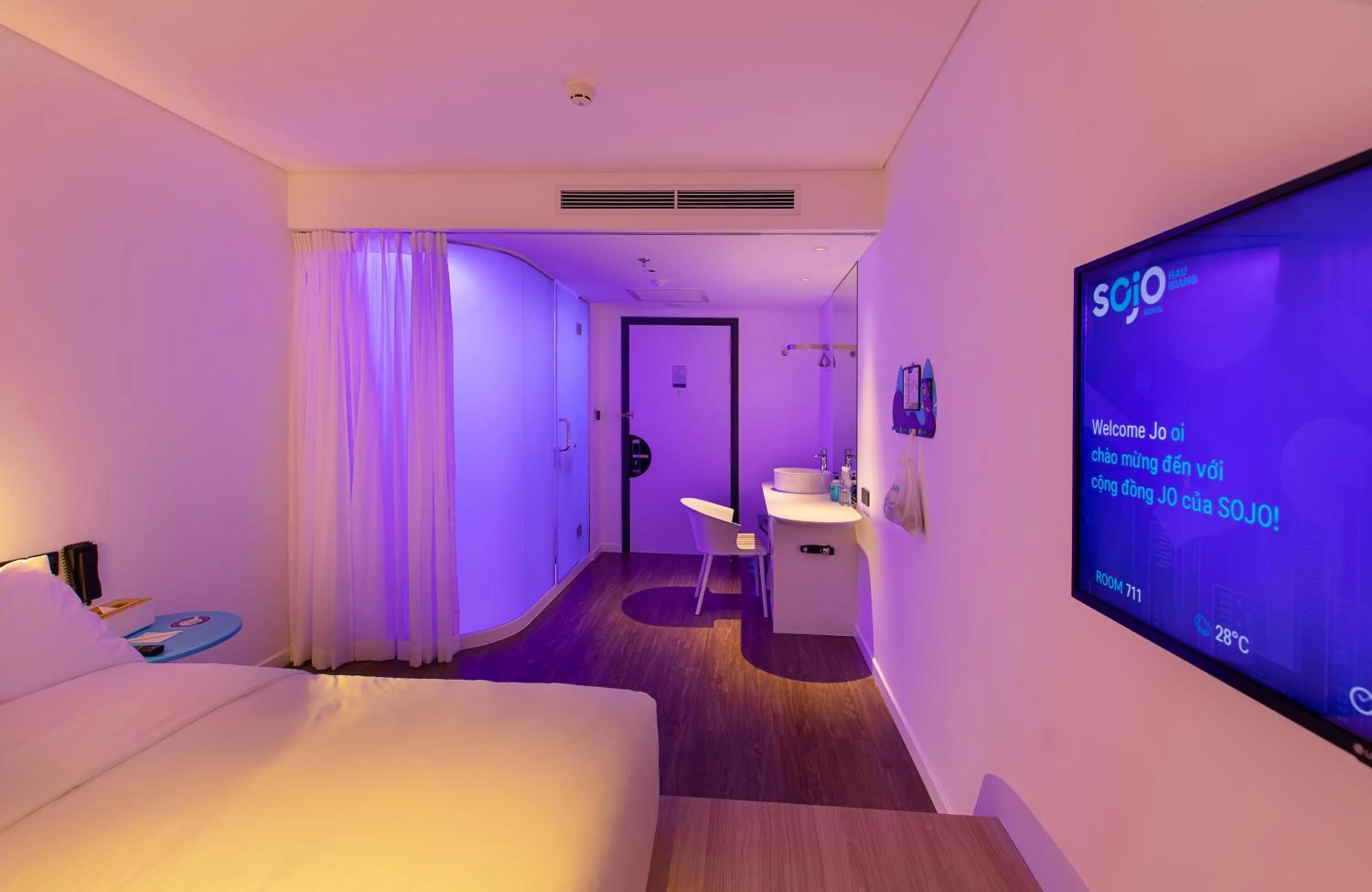 Photo of the whole room, Bed in SOJO Hotel Hau Giang